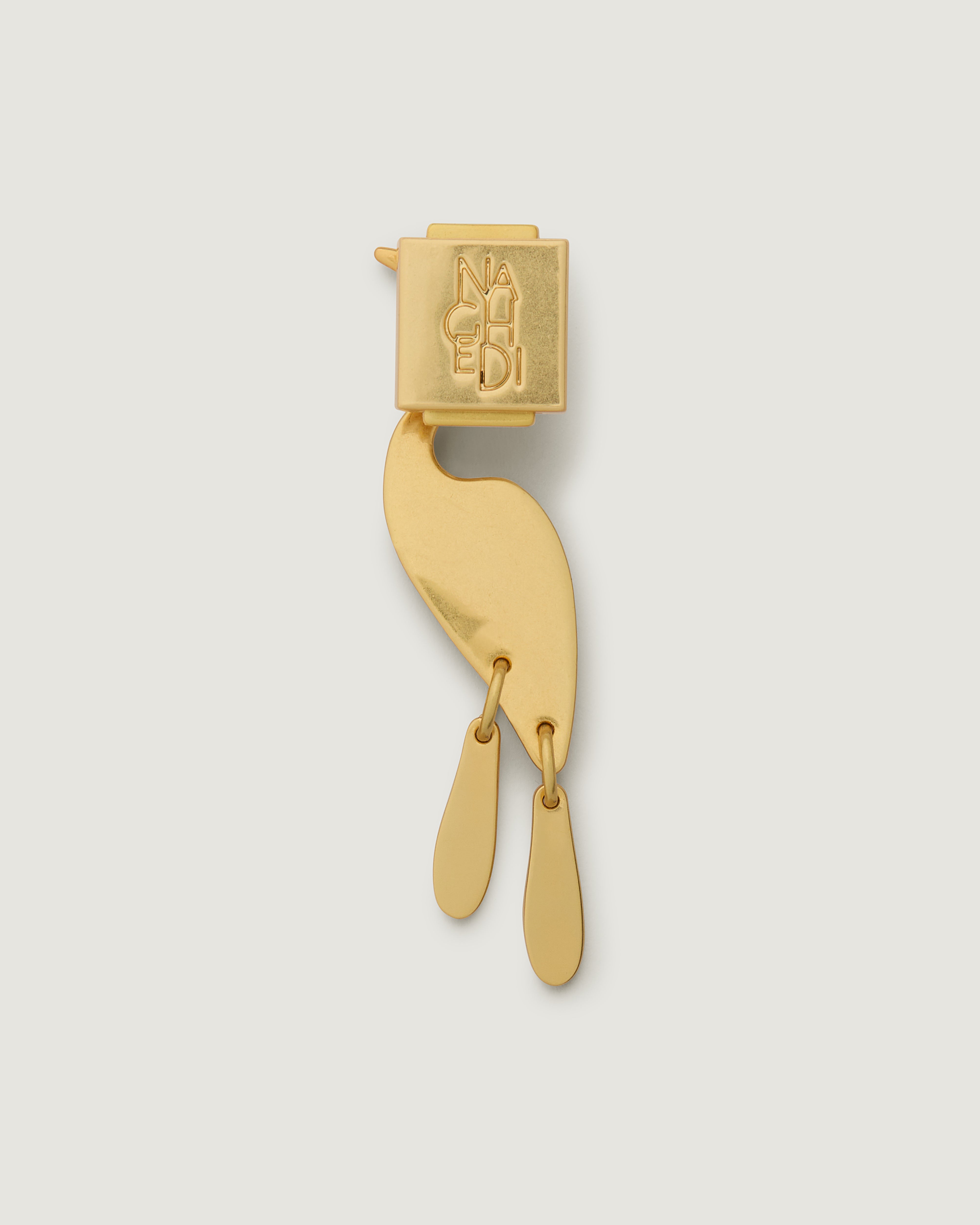 Close up of the Bird of Paradise Bag Charm highlighting the pin backing.