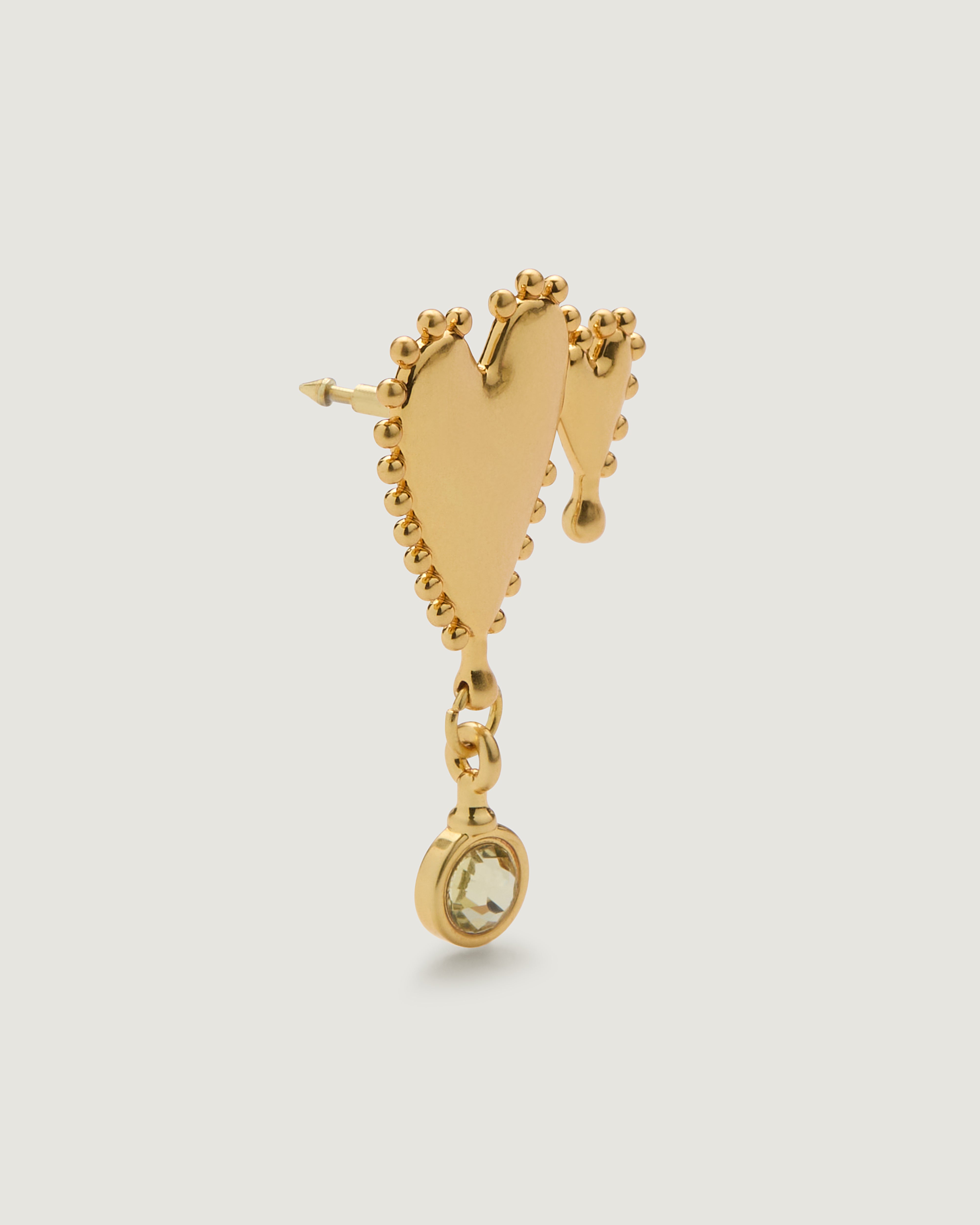 Angle view of the Heart of Gold Bag Charm highlighting the pin.