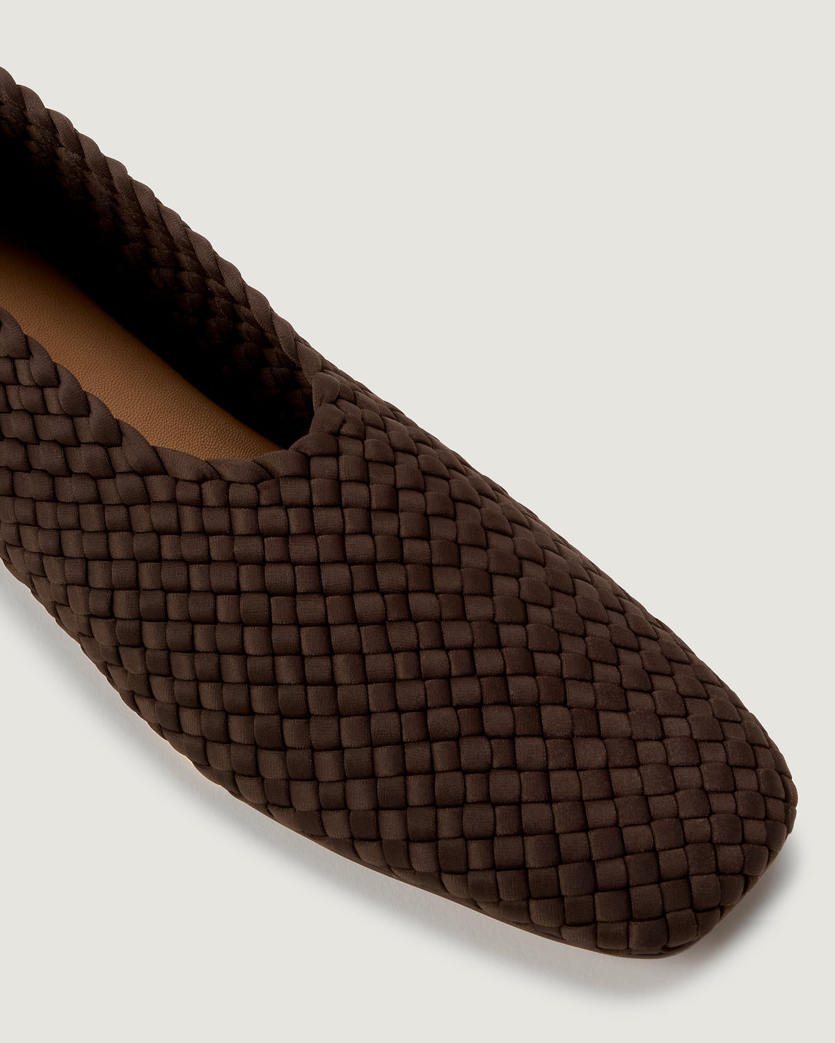 Close-up of The Jeju Glove flat in Chocolate showing its closed toe and square silhouette.