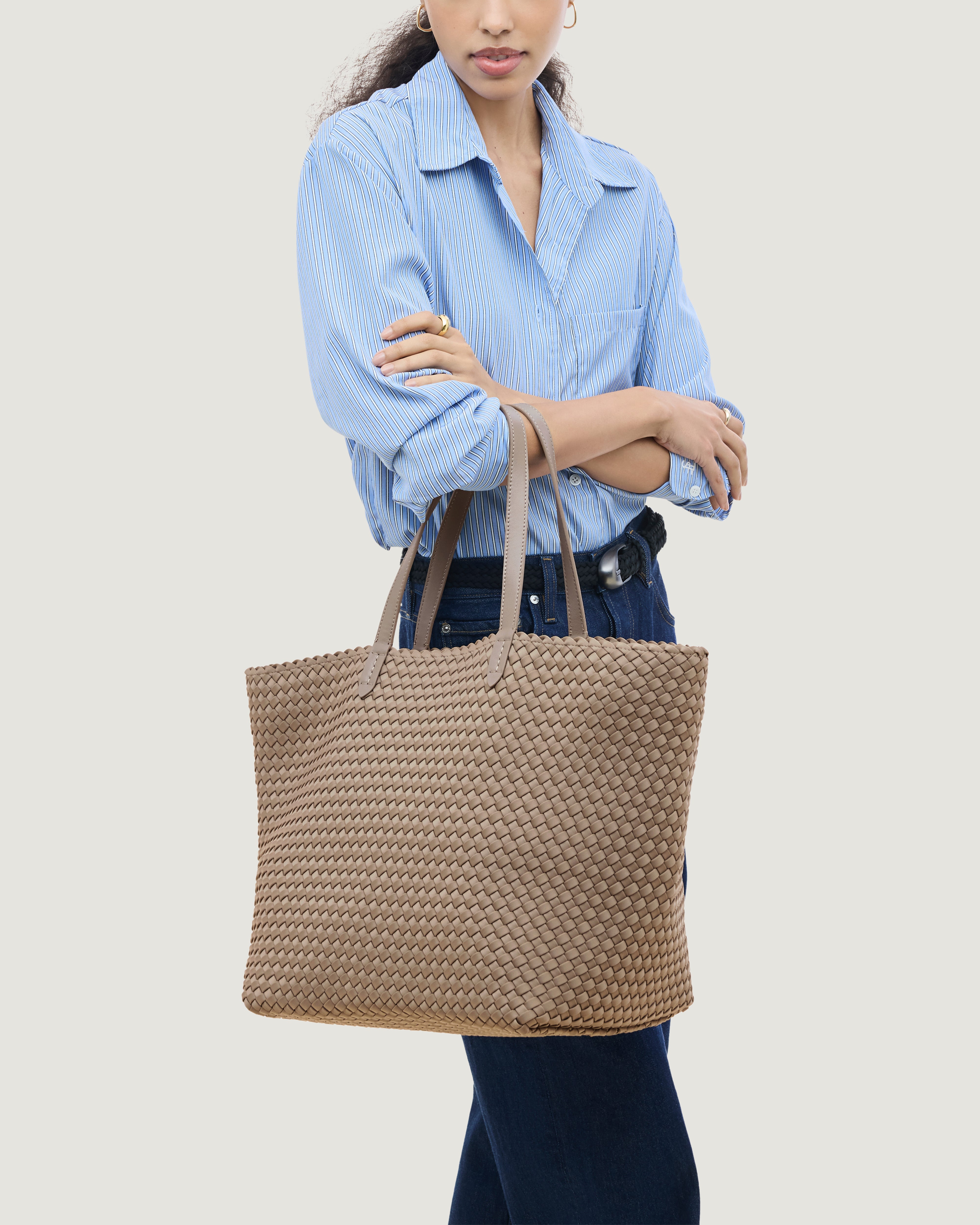 Jetsetter Tote in Cashmere shown on model to illustrate scale and soft silhouette.