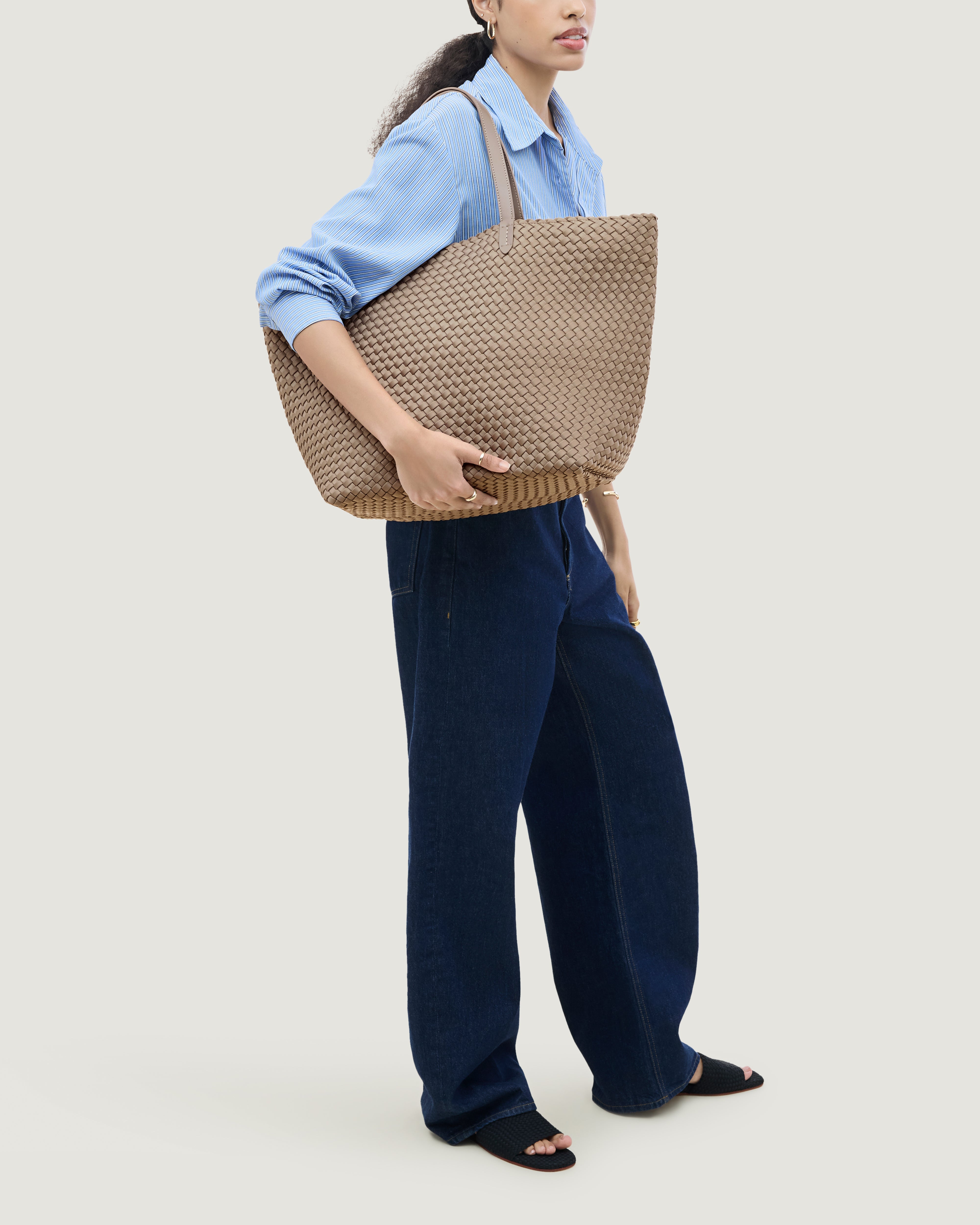 Jetsetter Tote in Cashmere shown on model to illustrate scale and soft silhouette.