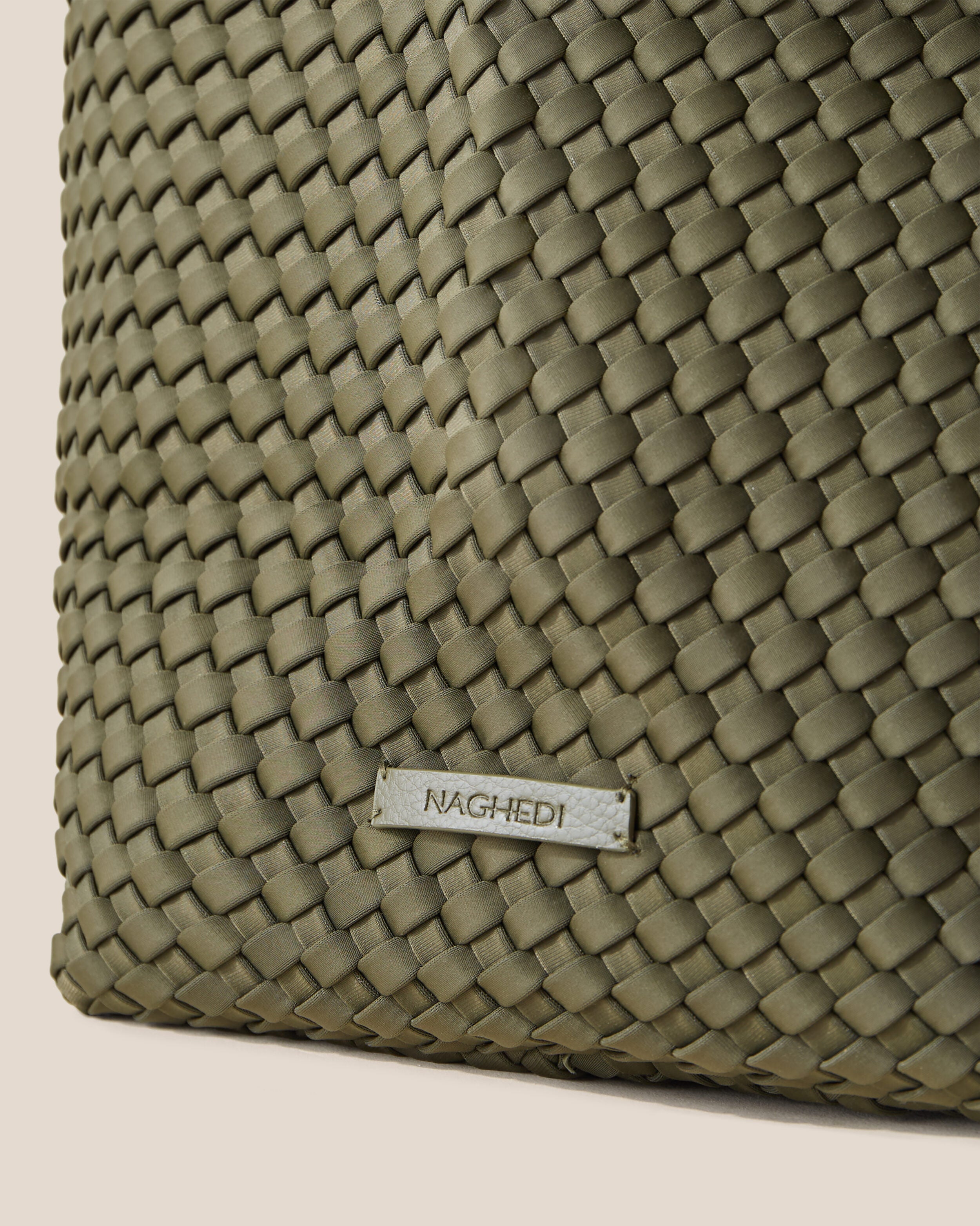 Close-up of stamped NAGHEDI logo on Jetsetter Tote in Olive.