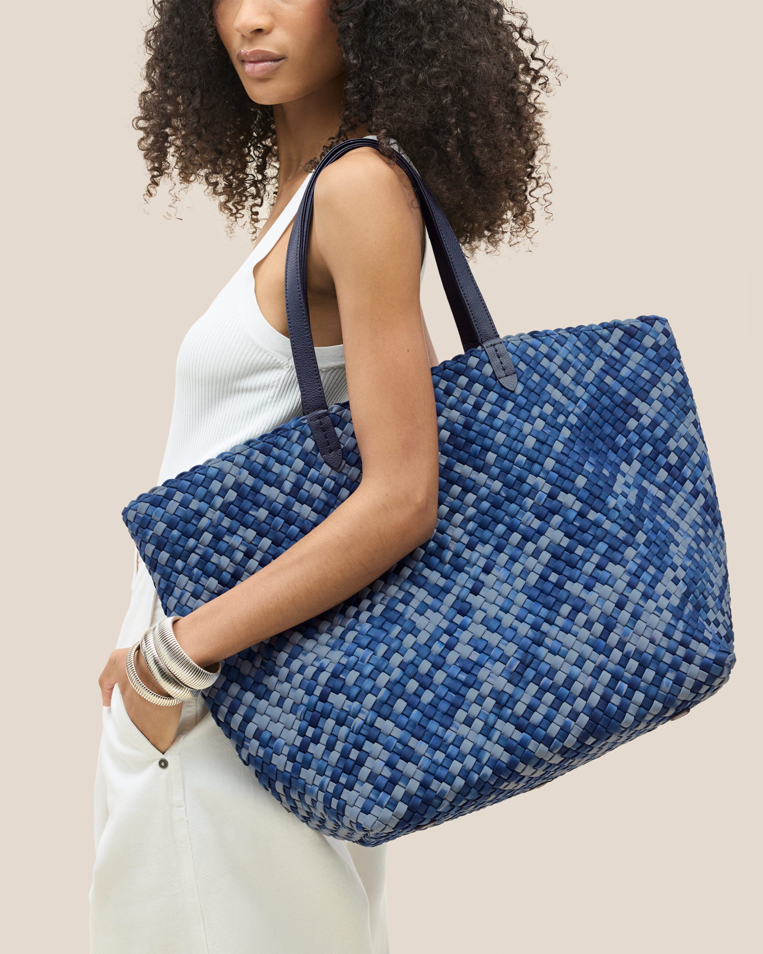 Jetsetter Tote in Paros shown on model to illustrate scale and soft silhouette.