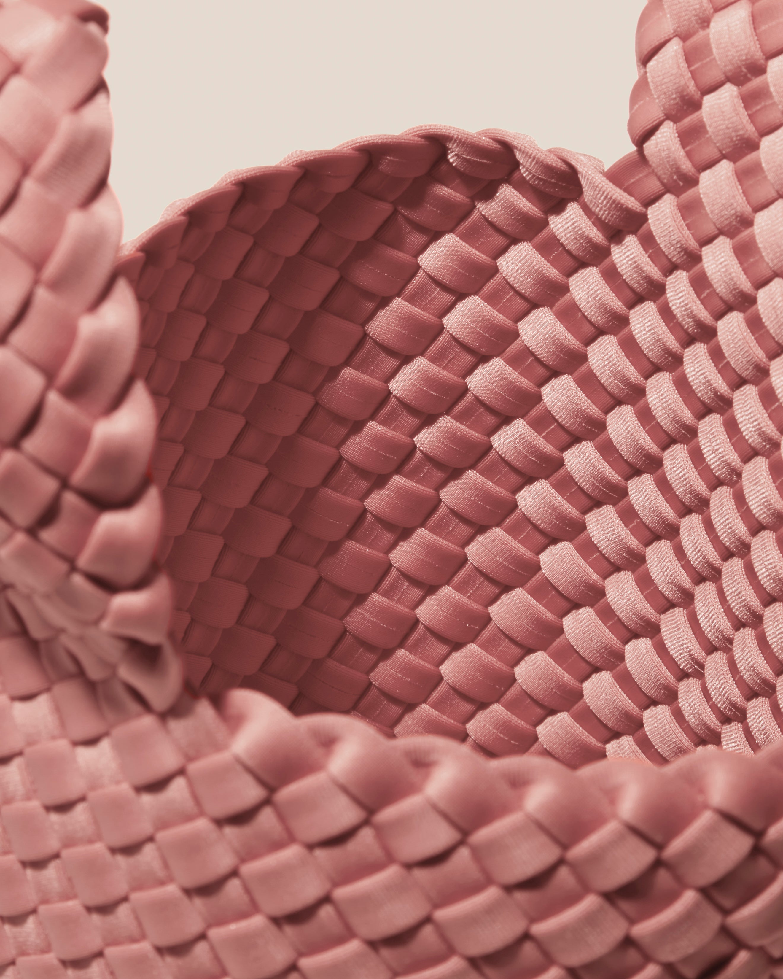 Interior close-up of Kyoto Clutch in Dusk showing its secure slide-through loop closure, and unlined interior.