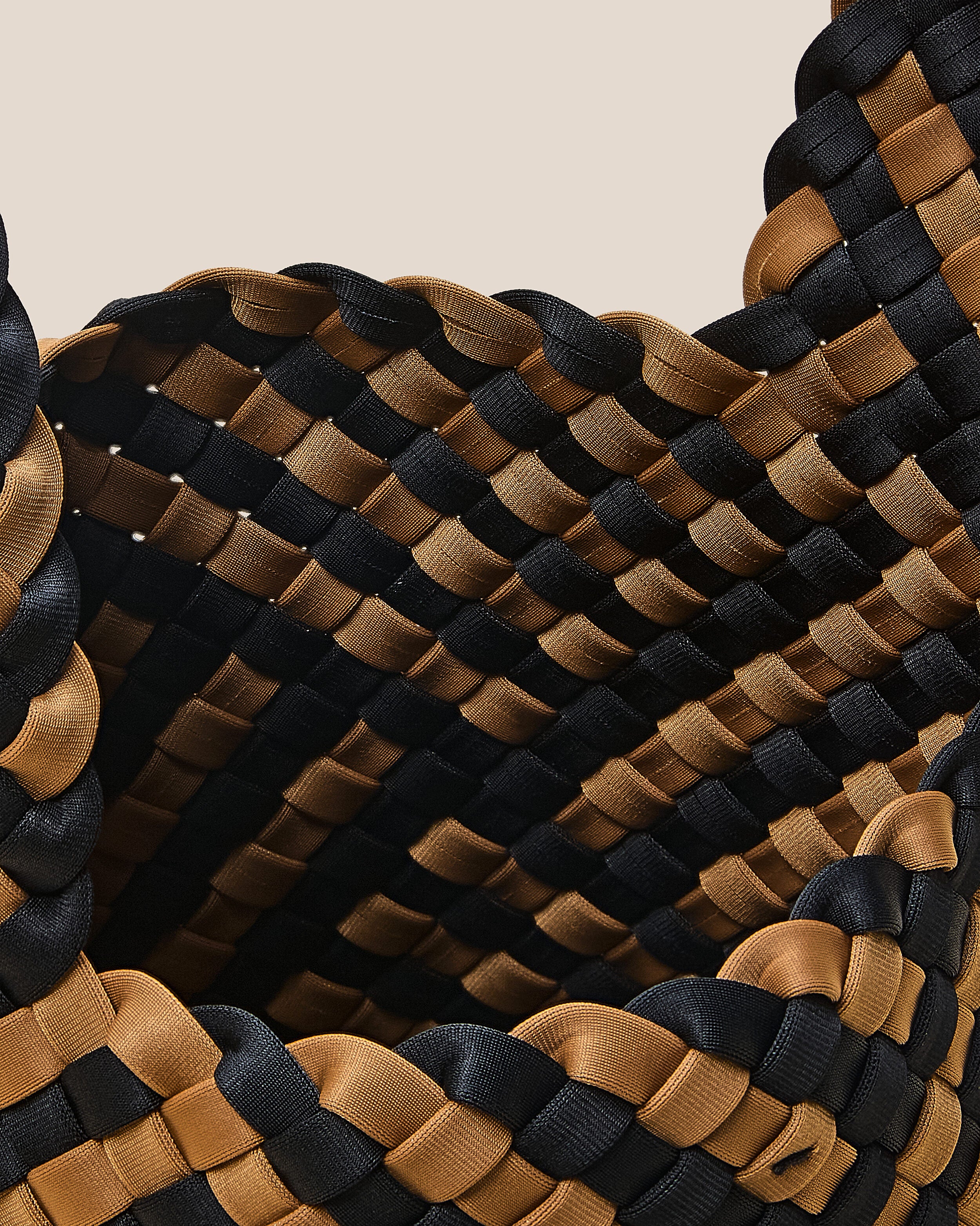 Interior close-up of Kyoto Clutch in Ravenna showing its secure slide-through loop closure, and unlined interior.