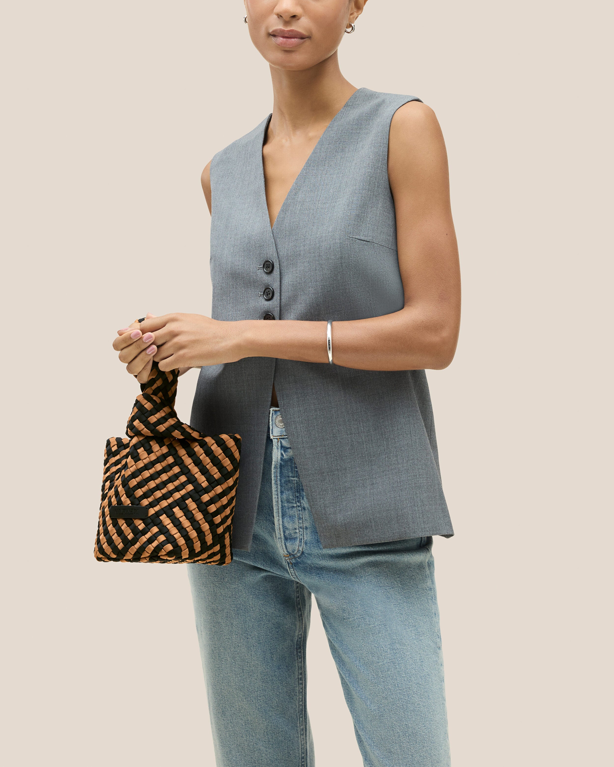 Kyoto Clutch in Ravenna shown on model to illustrate scale and soft silhouette.