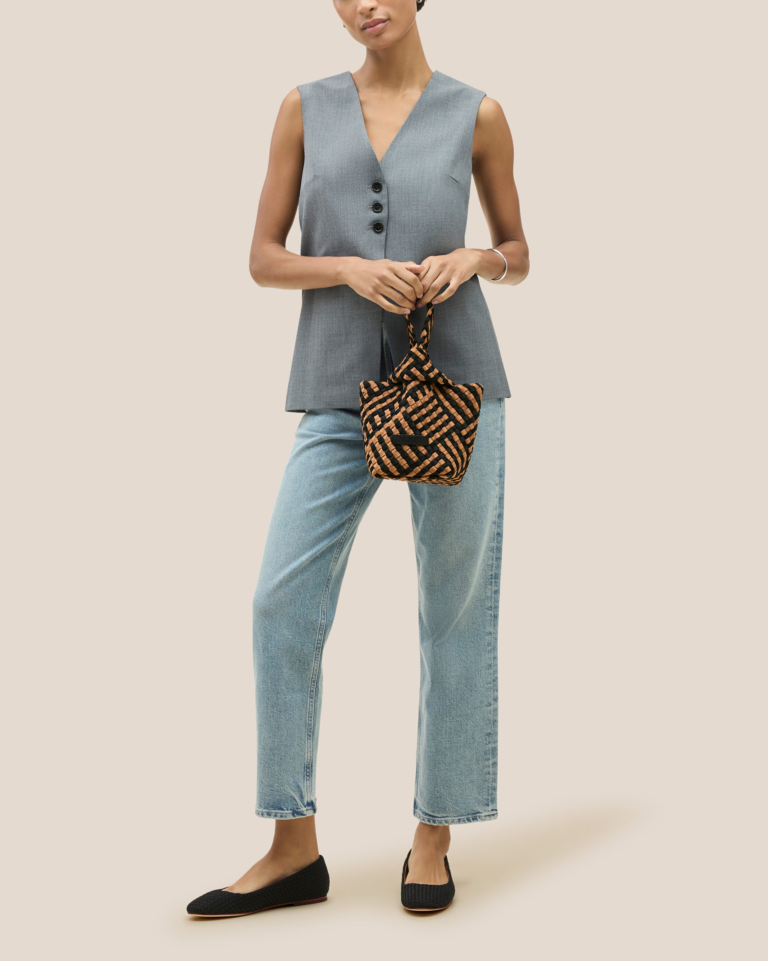 Kyoto Clutch in Ravenna shown on model to illustrate scale and soft silhouette.