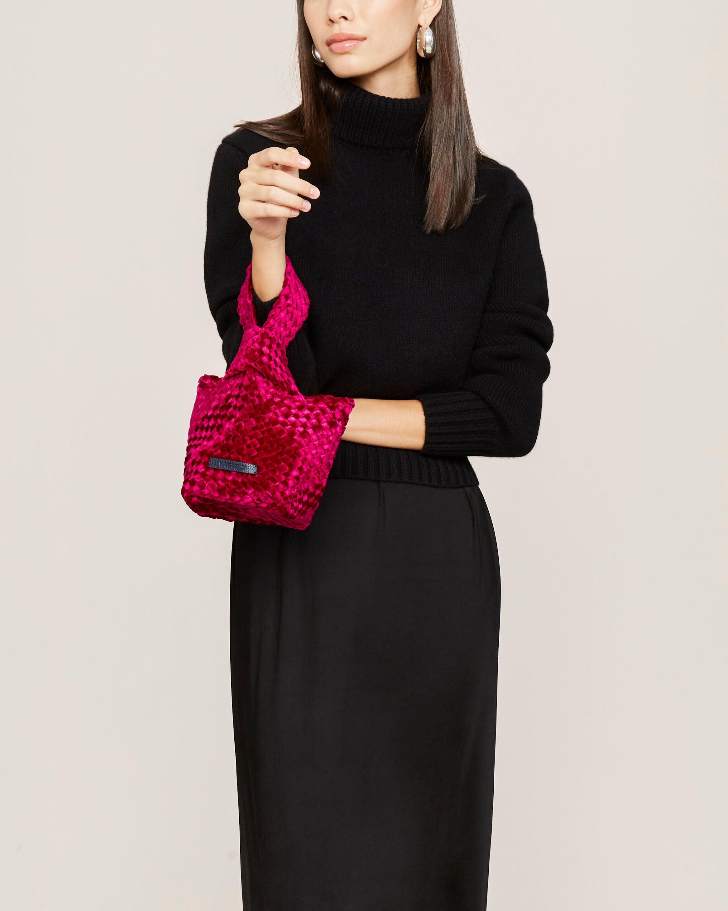 Kyoto Clutch in Crush shown on model to illustrate scale and soft silhouette.