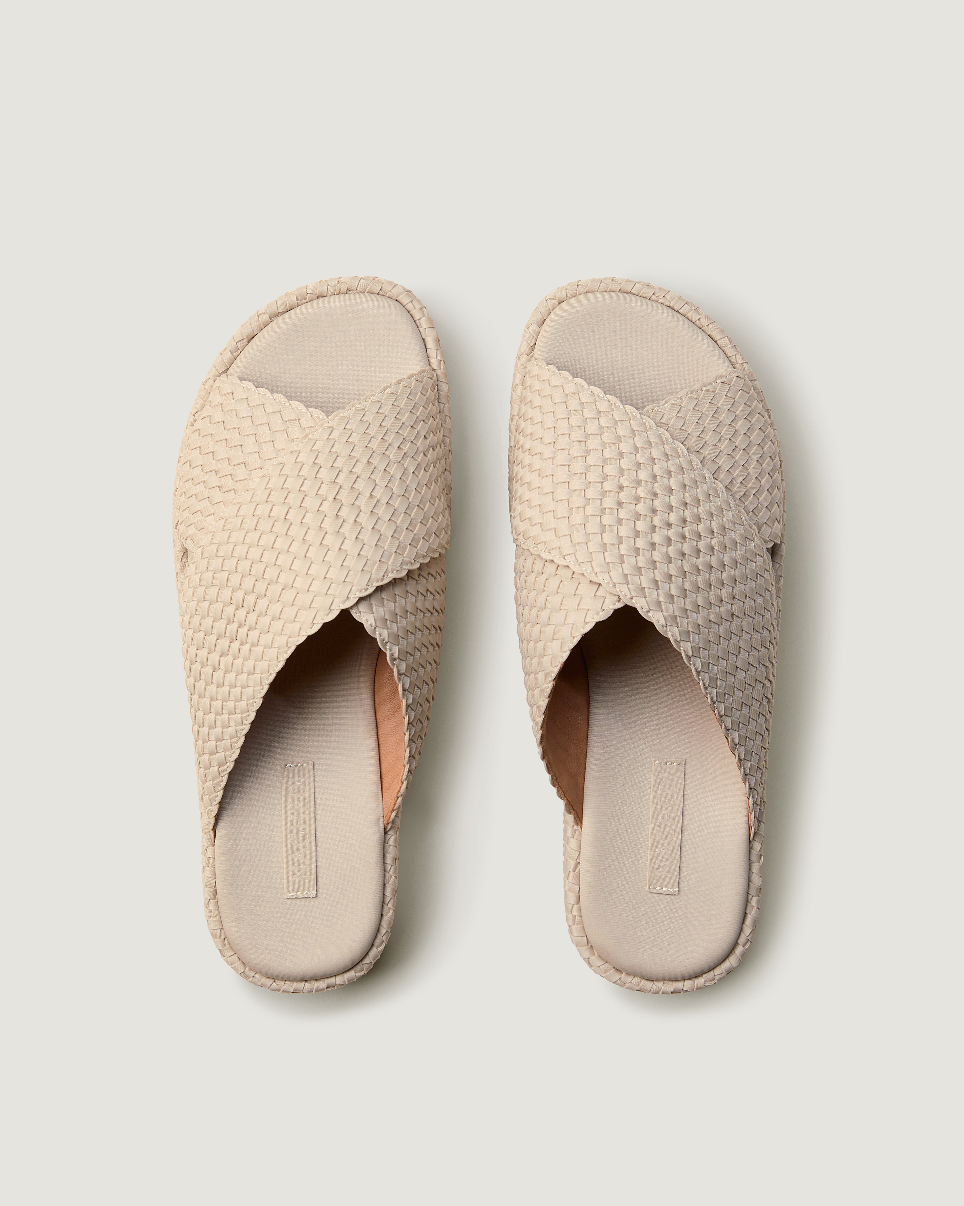 Top view of pair of The Laguna Platform in Ecru showing the padded neoprene insole.