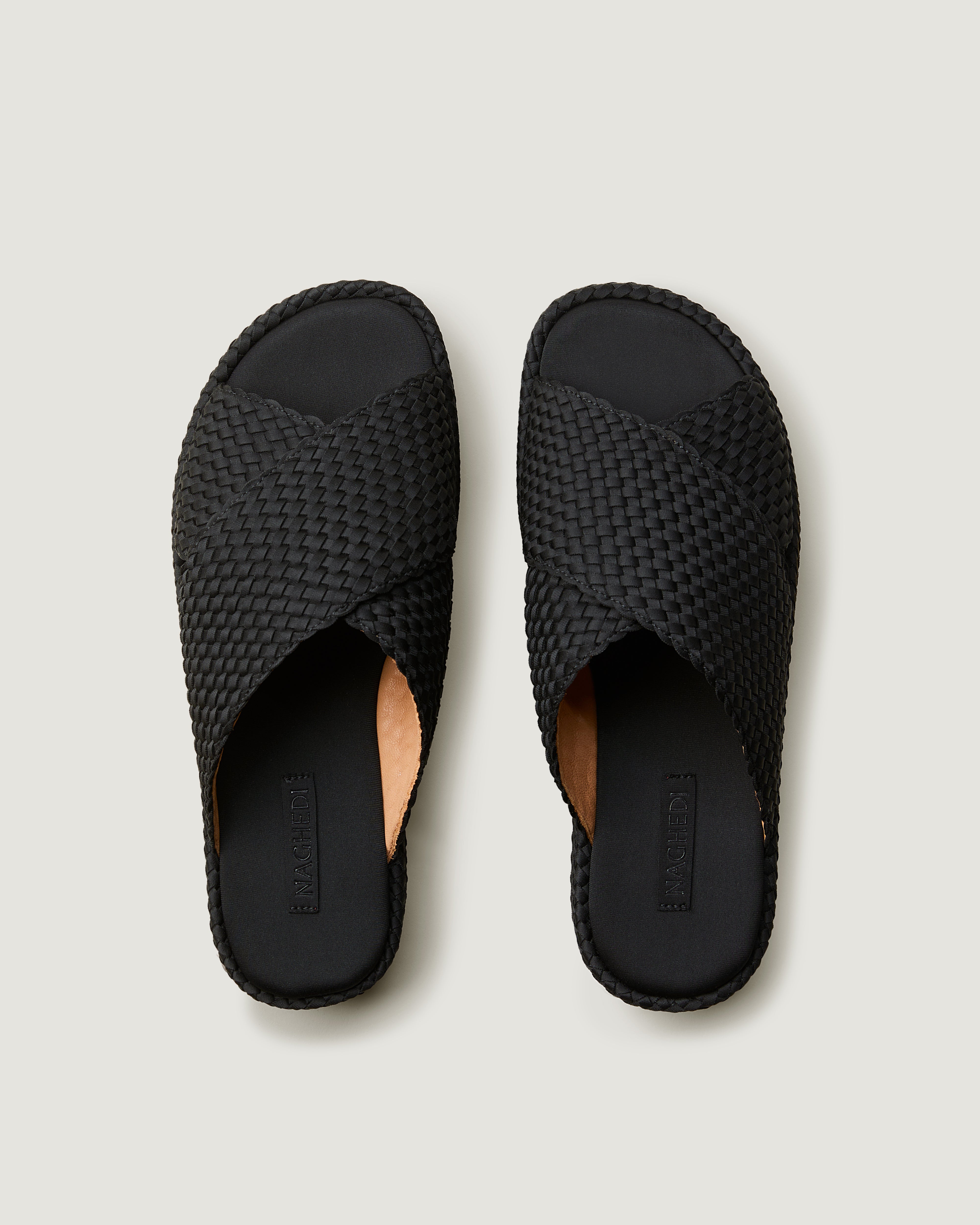 Top view of pair of The Laguna Platform in Onyx showing the padded neoprene insole.