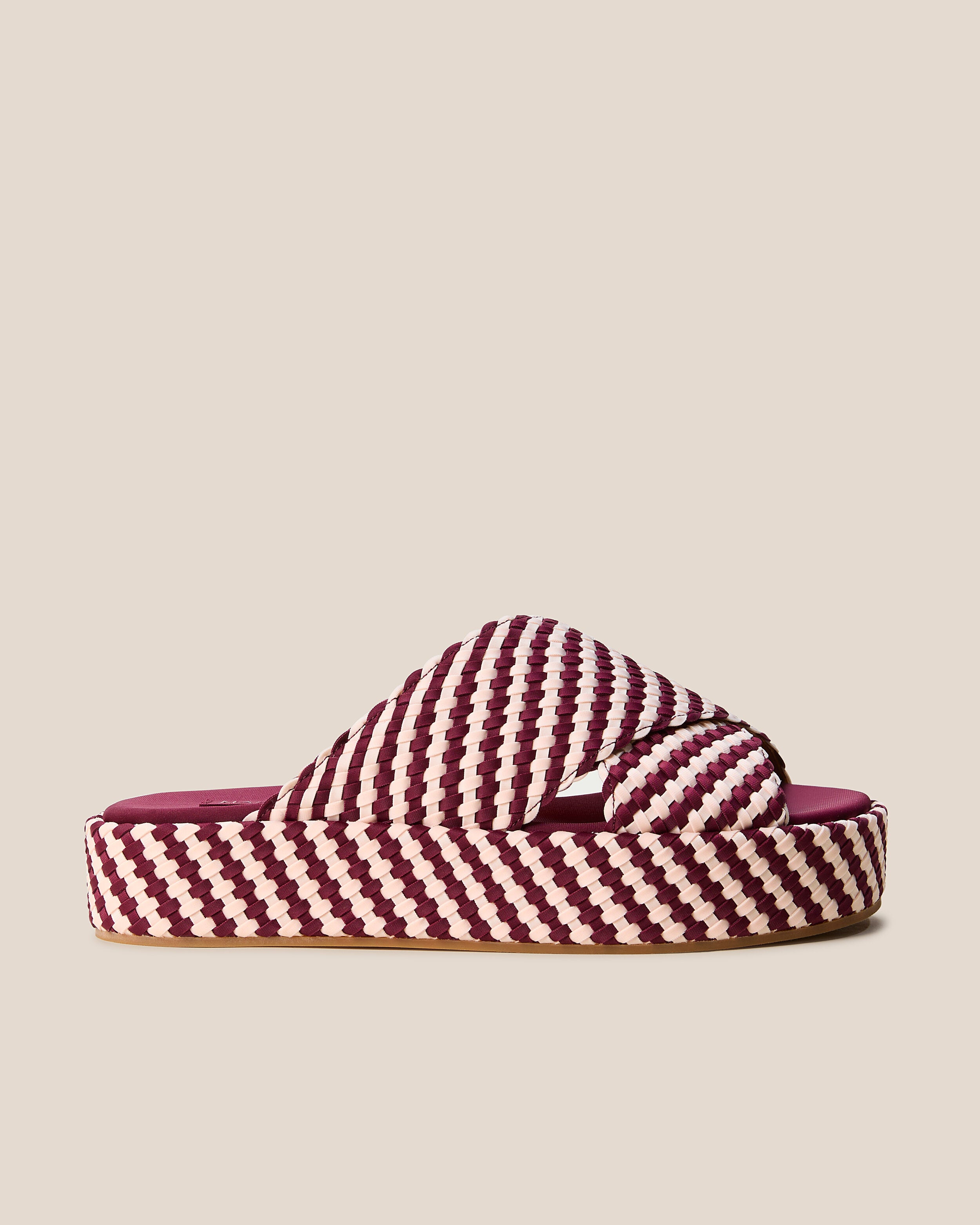 Side view of The Laguna Platform in Jaipur, a burgundy and peach tone, featuring an open toe and round silhouette.