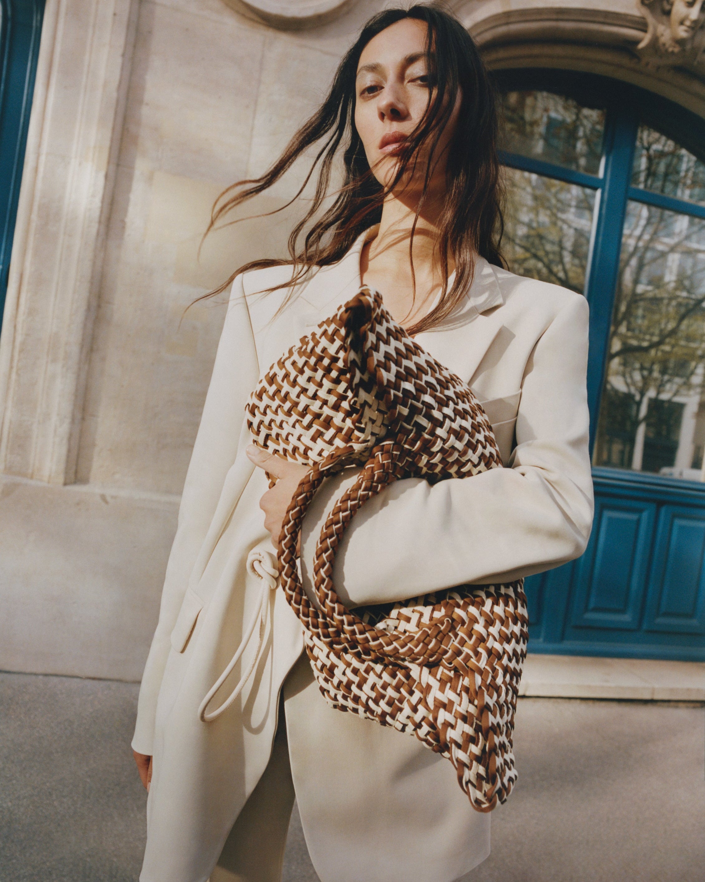 St. Barths Tote in Carmel shown on model to illustrate scale and soft silhouette.