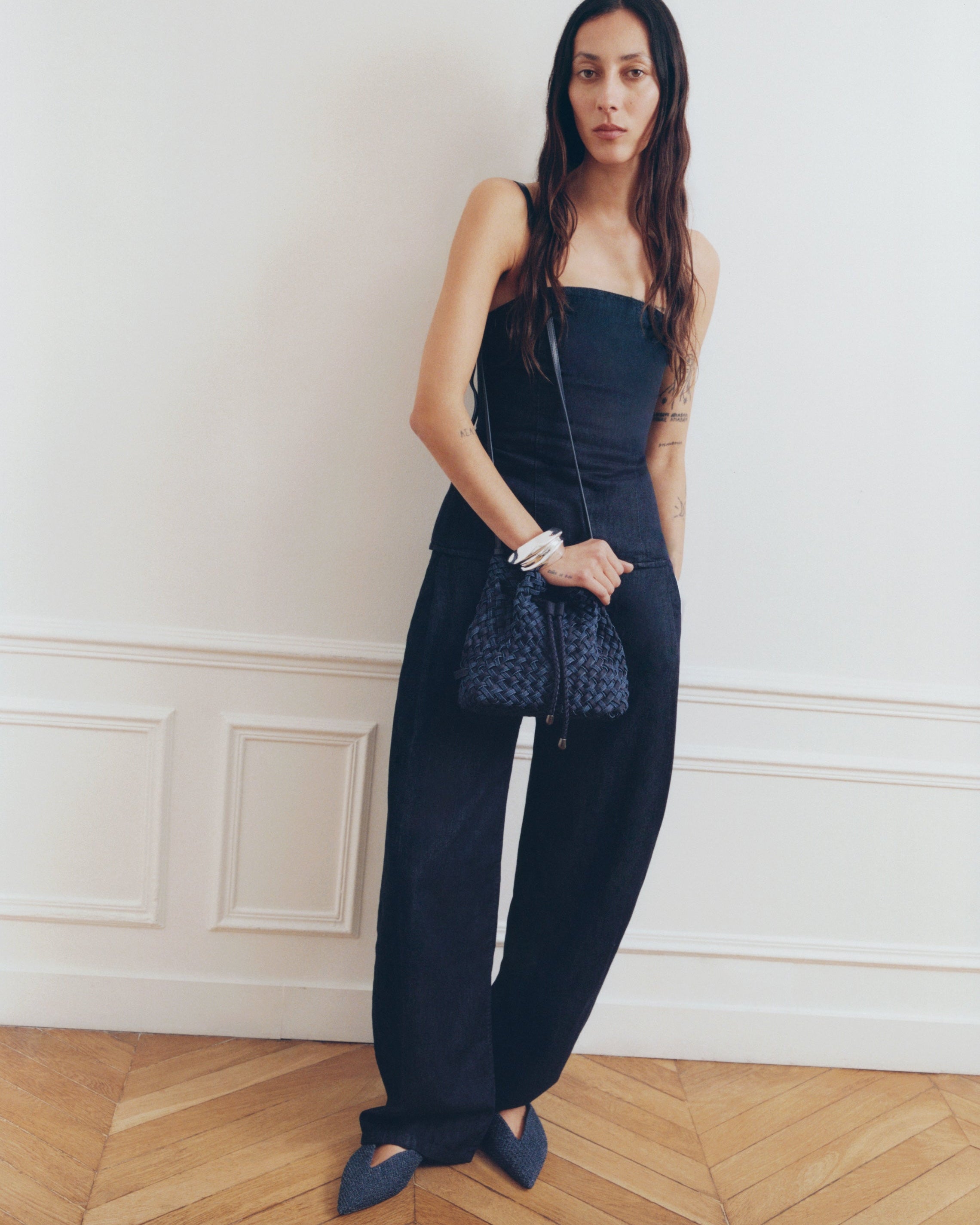 Gramercy Bucket in Indigo shown on model to illustrate scale and soft silhouette.