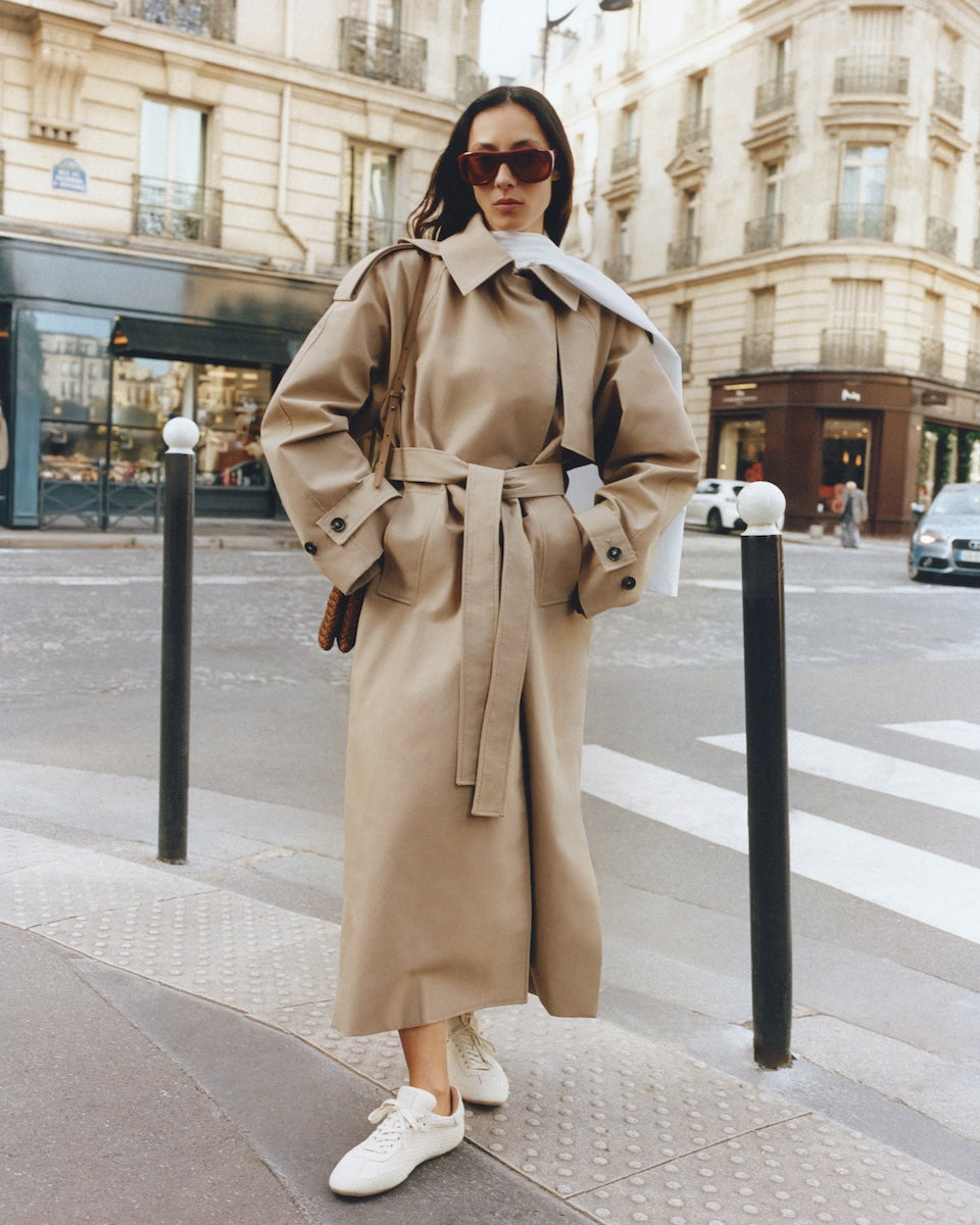 Full body on model view of the Milan Sneaker in Salt. Highlighting the handwoven neoprene and suede tonal combination.