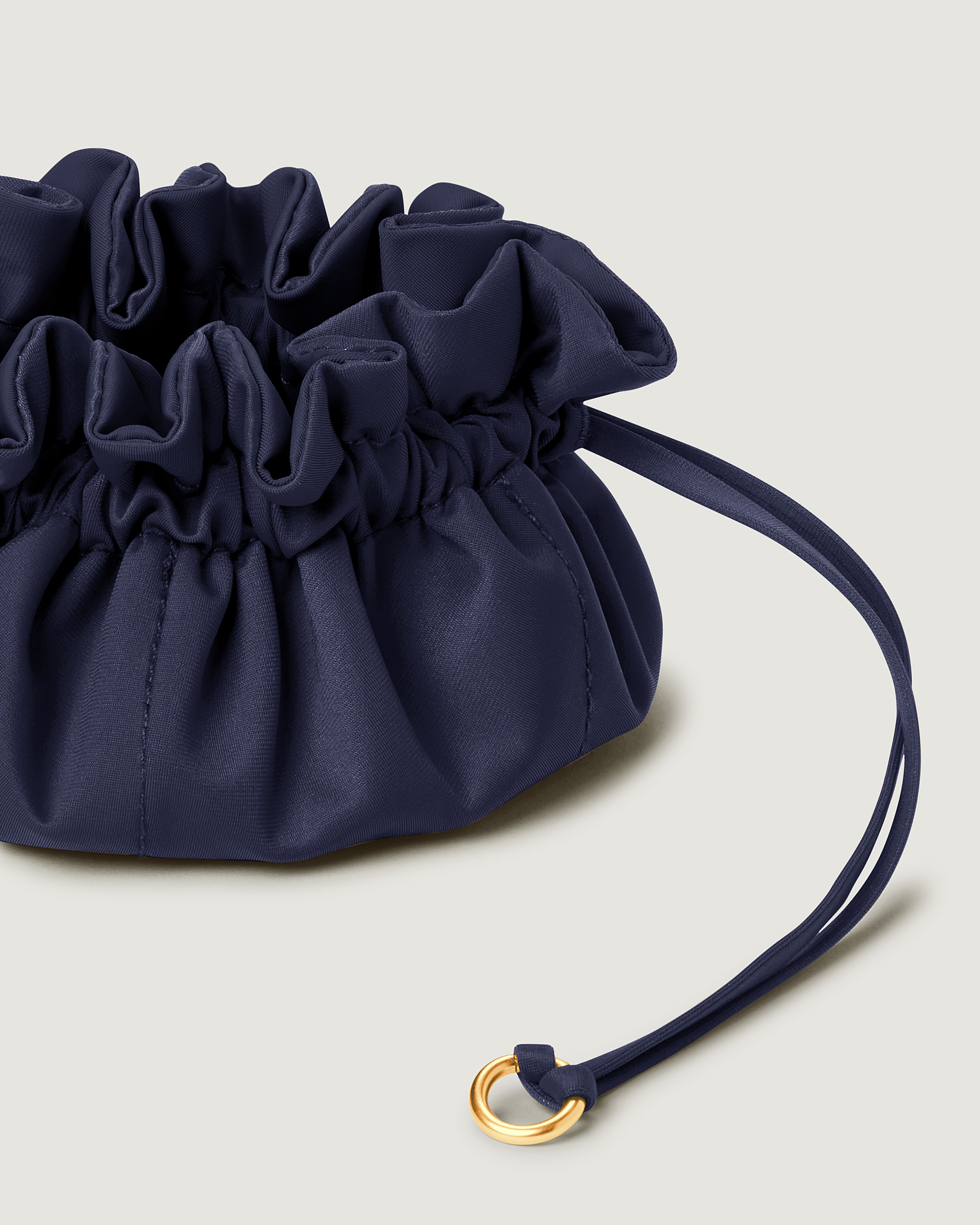 Close-up of handwoven detailing on Lotus Jewelry Pouch in Ink Blue.