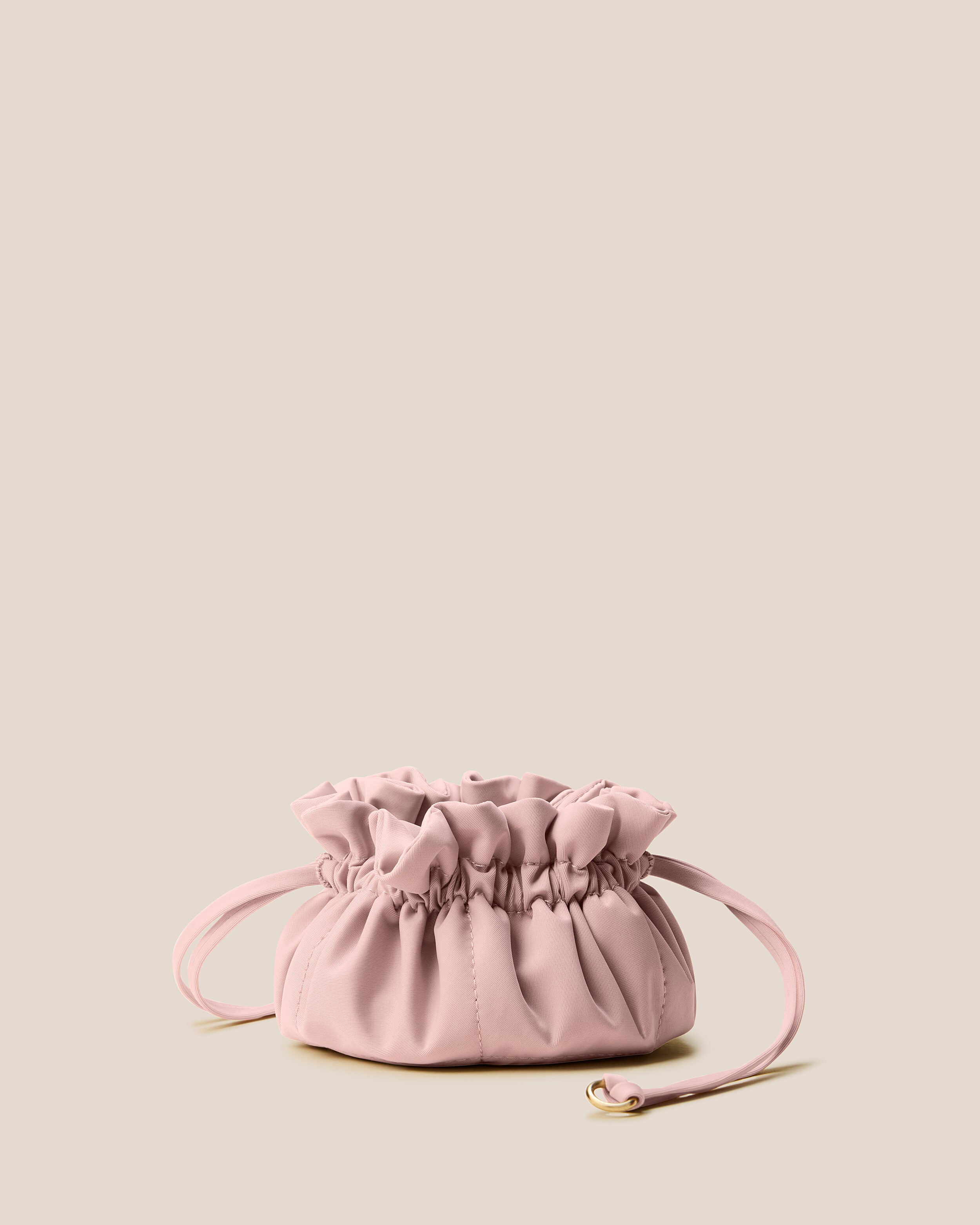 Lotus Jewelry Pouch in Petal featuring a drawstring closure.