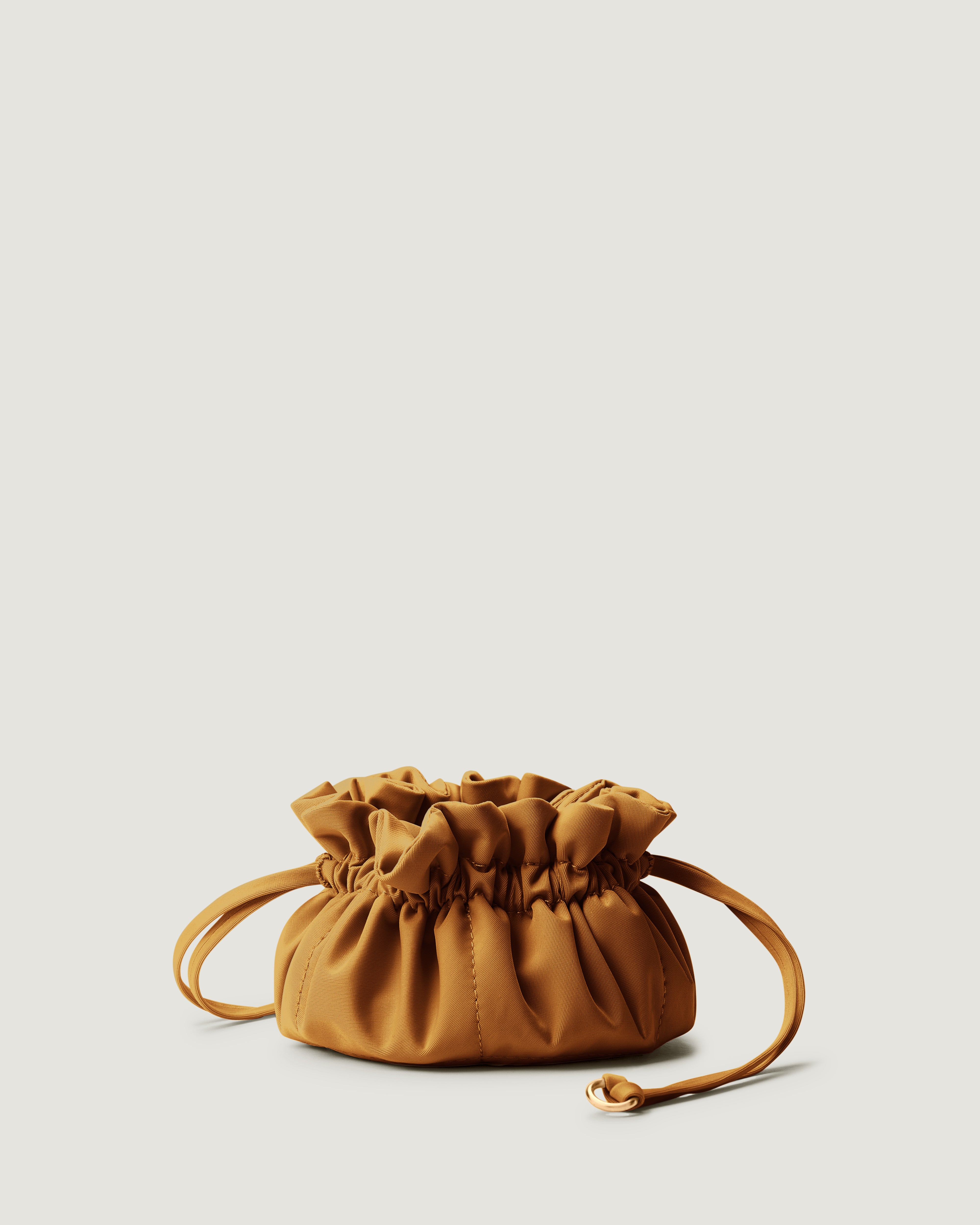 A small golden chartreuse neoprene drawstring jewelry pouch.