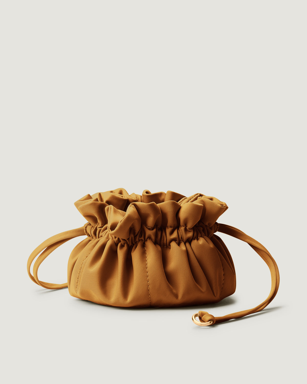 A small golden chartreuse neoprene drawstring jewelry pouch.
