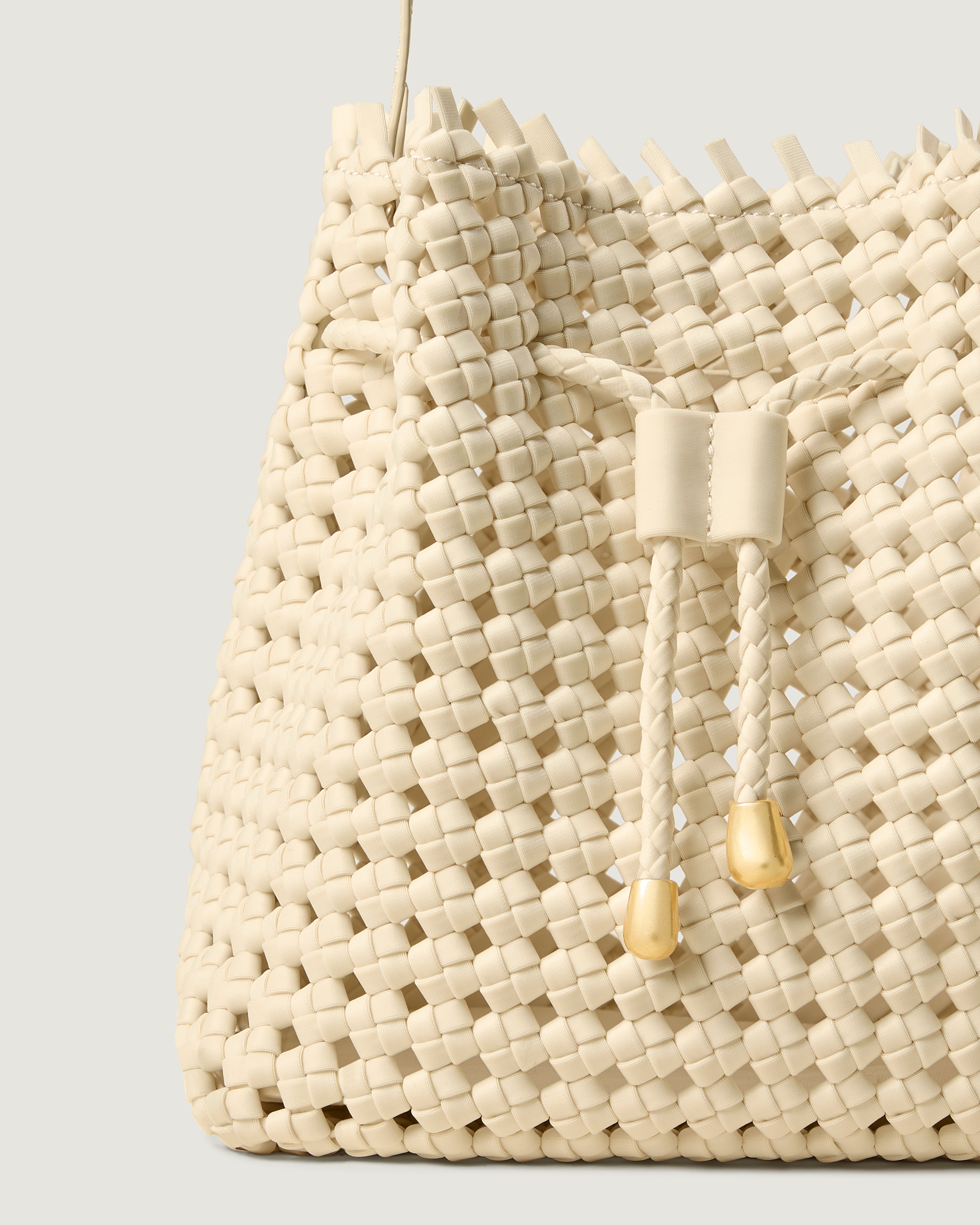 Close-up of handwoven detailing on Mallorca Bucket in Salt.