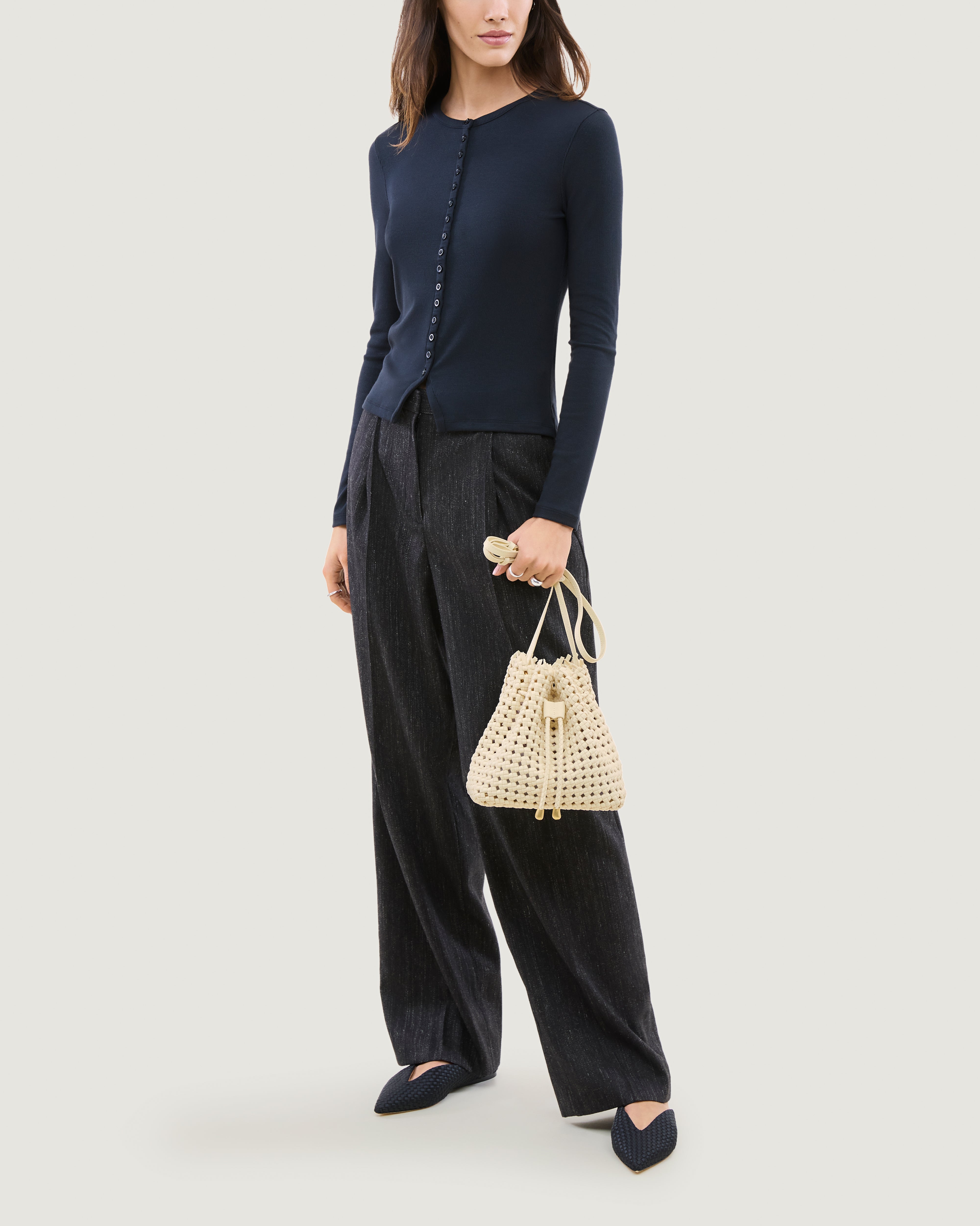 Mallorca Bucket in Salt shown on model to illustrate scale and soft silhouette.