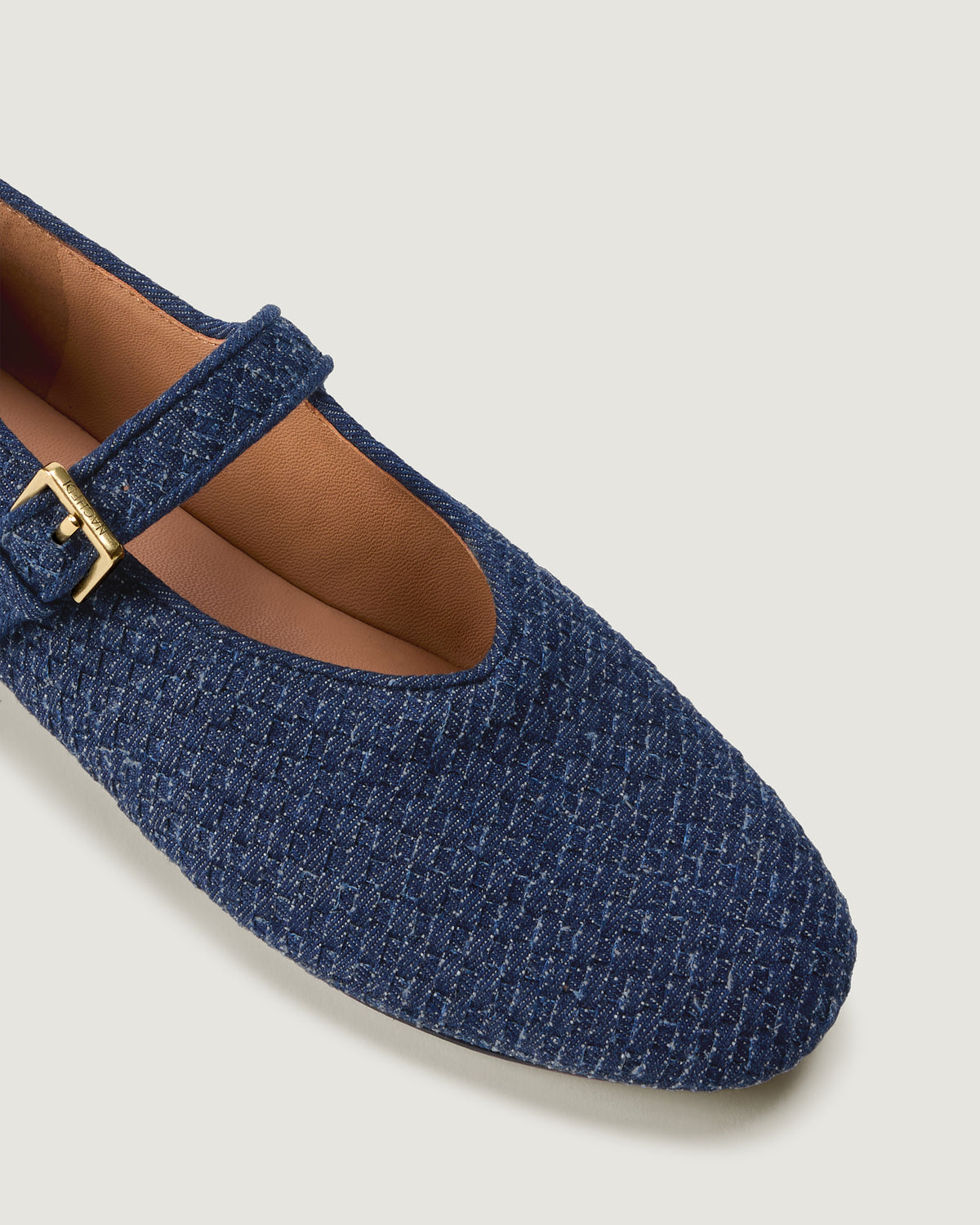 Close-up of The Marais Mary Jane in Denim showing its closed toe and round silhouette.