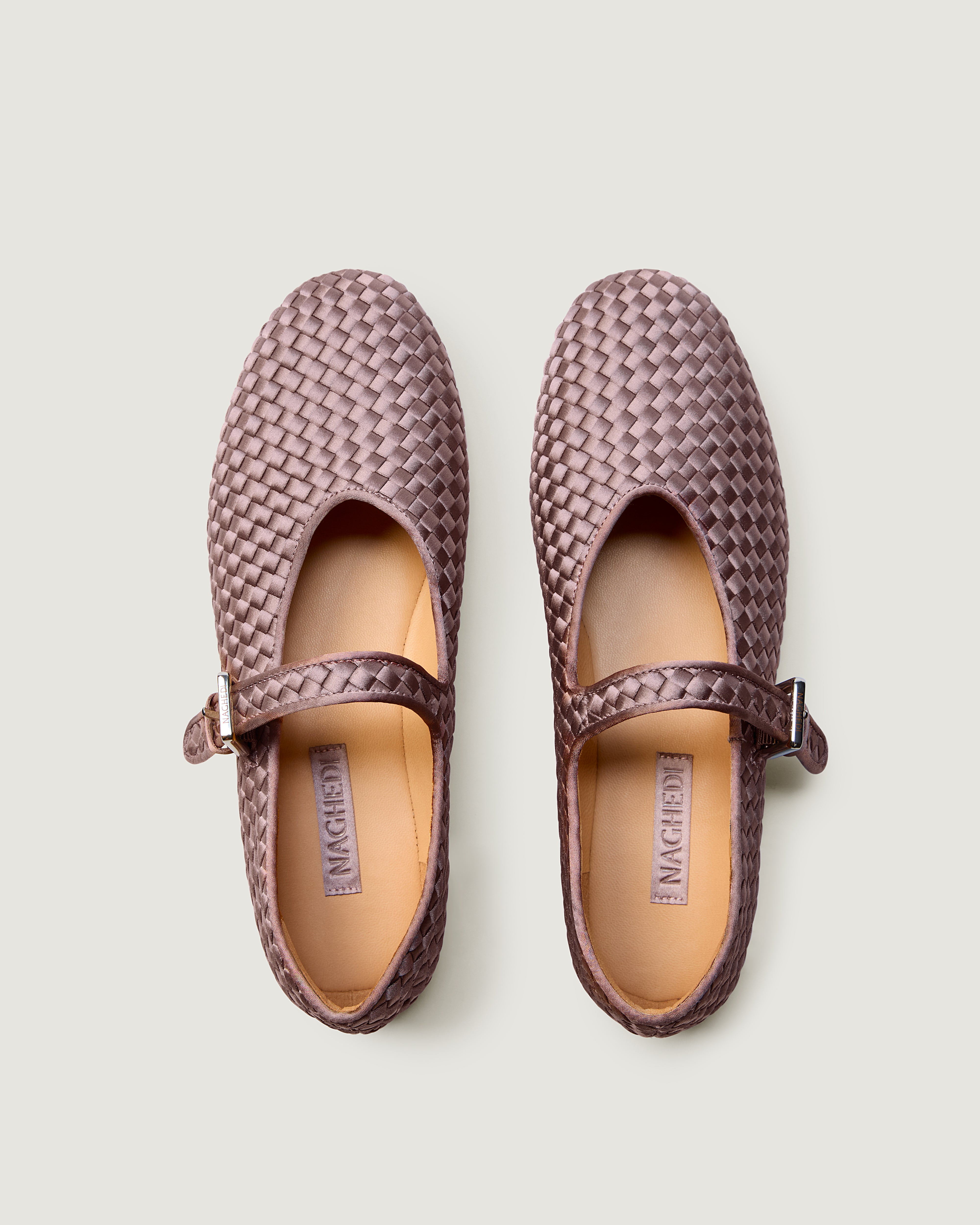 Top view of pair of The Marais Mary Jane in Lavender showing the natural tanned leather insole.