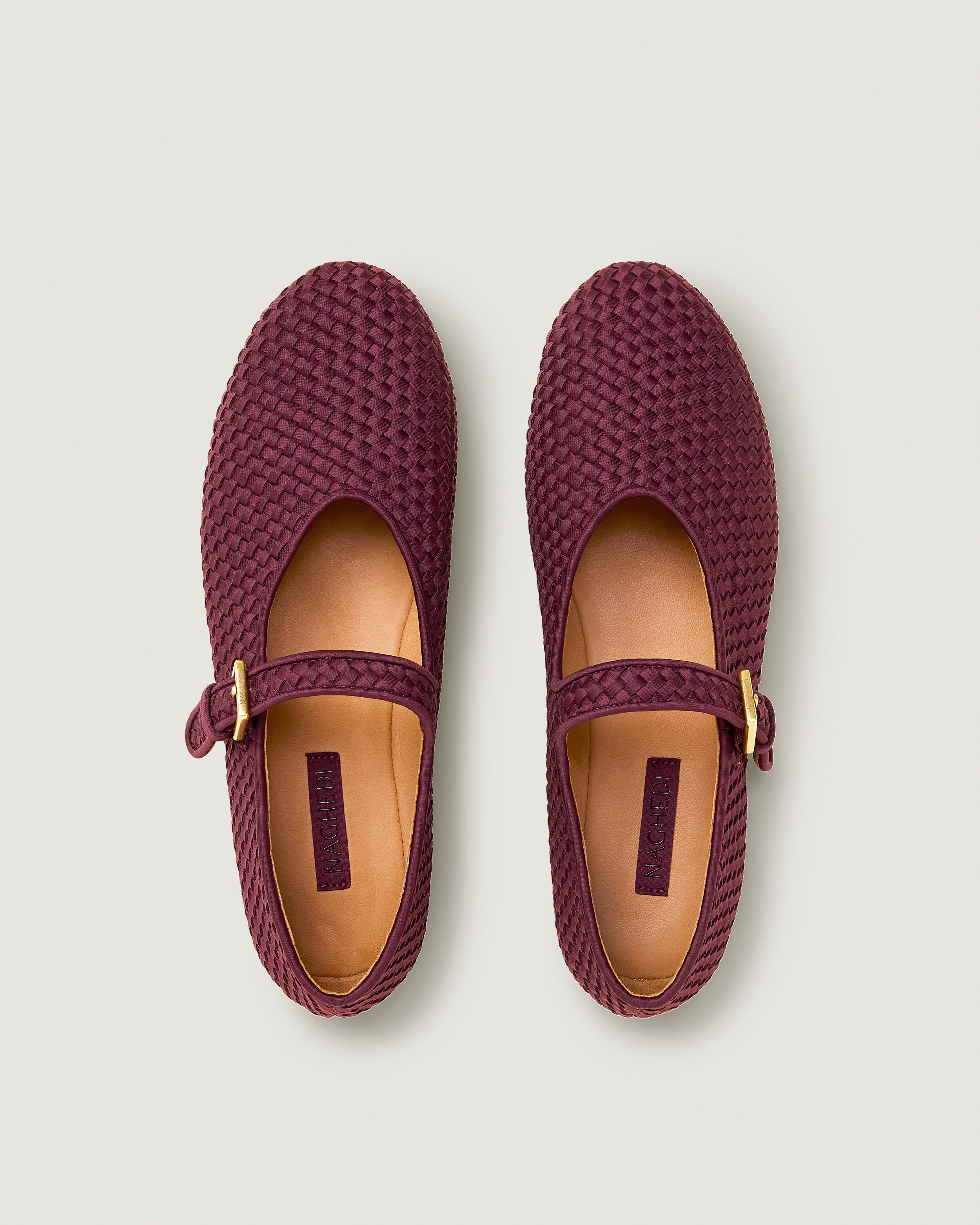 Top view of pair of The Marais Mary Jane in Bordeaux showing the natural tanned leather insole.