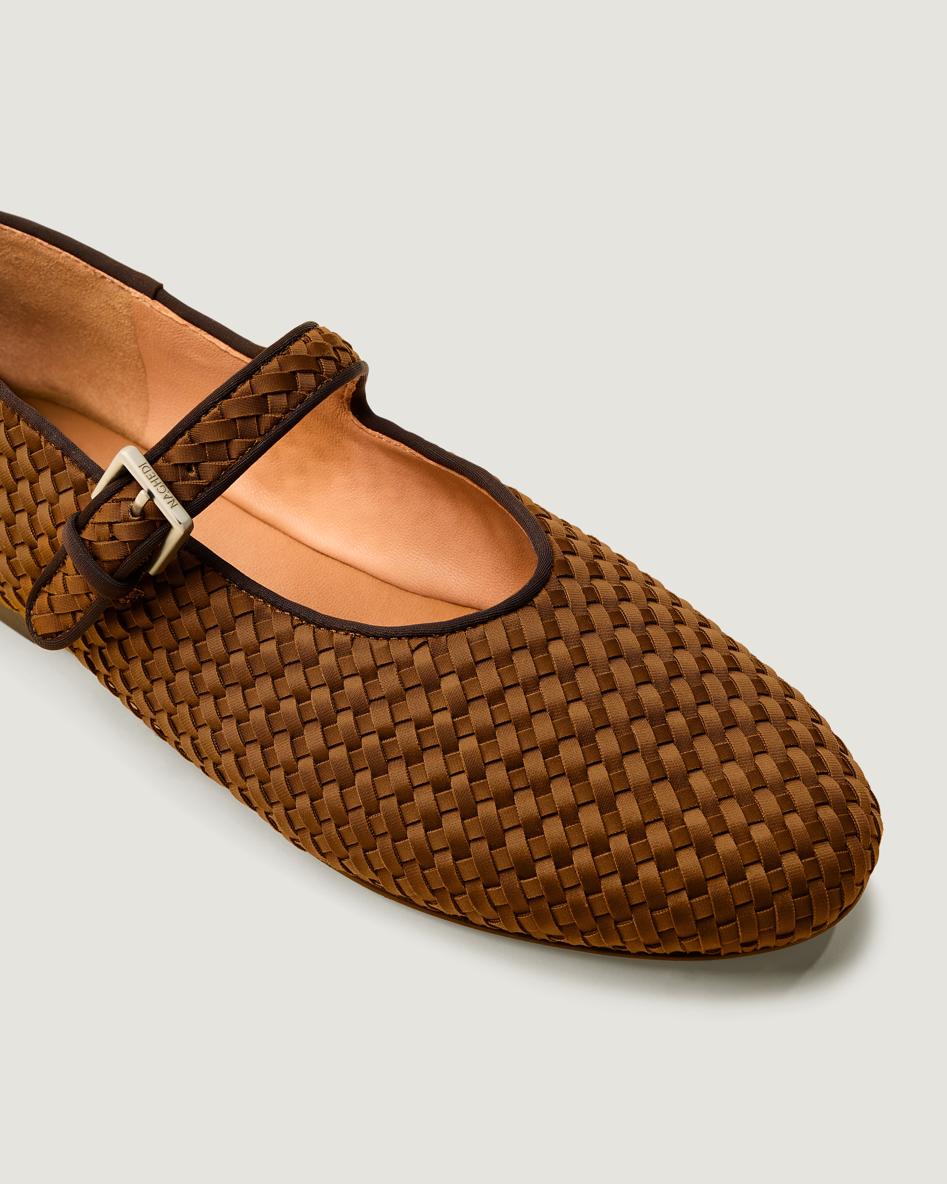 Close-up of The Marais Mary Jane in Teak showing its closed toe and round silhouette.