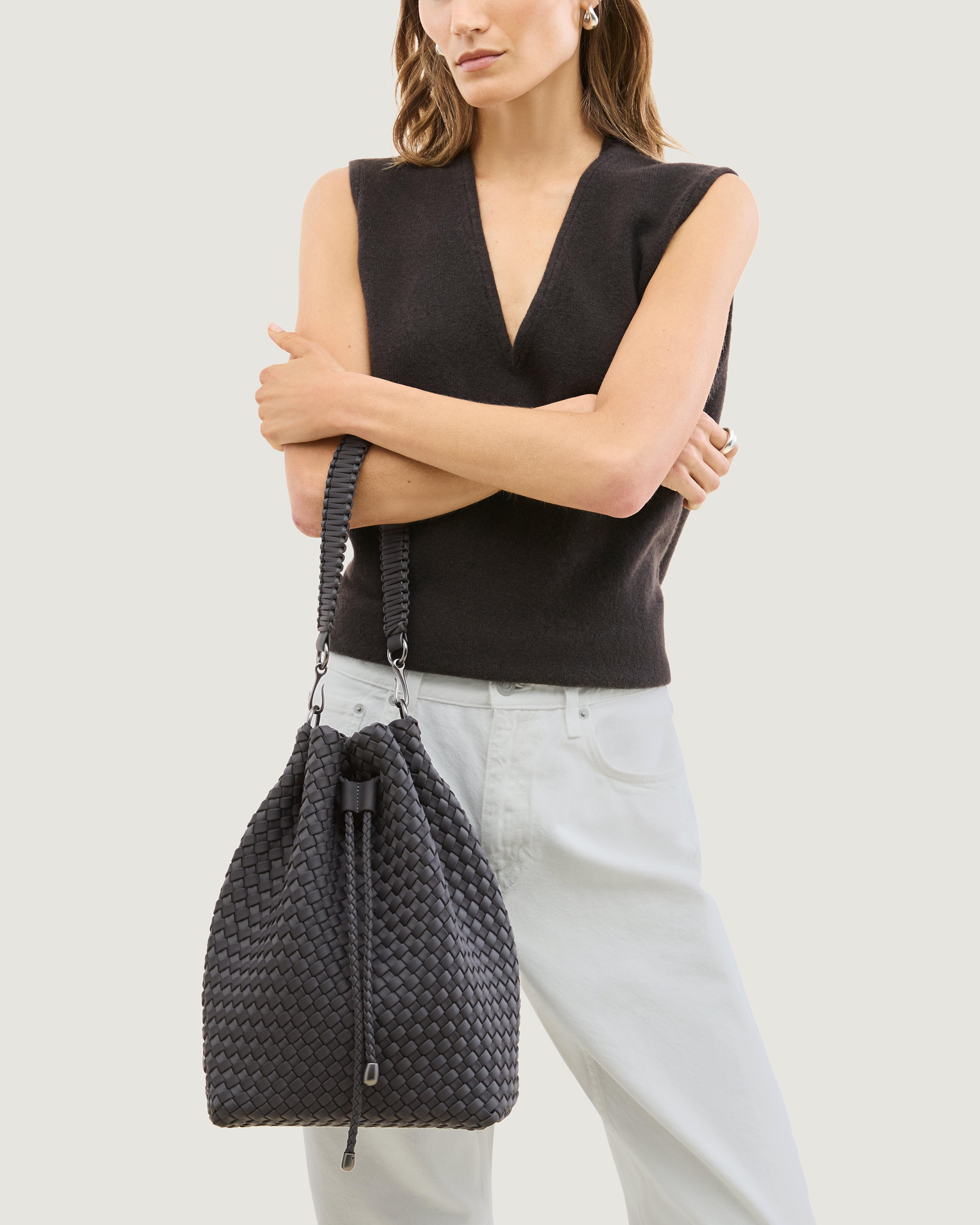 Mercer Bucket in Ash shown on model to illustrate scale and soft silhouette.