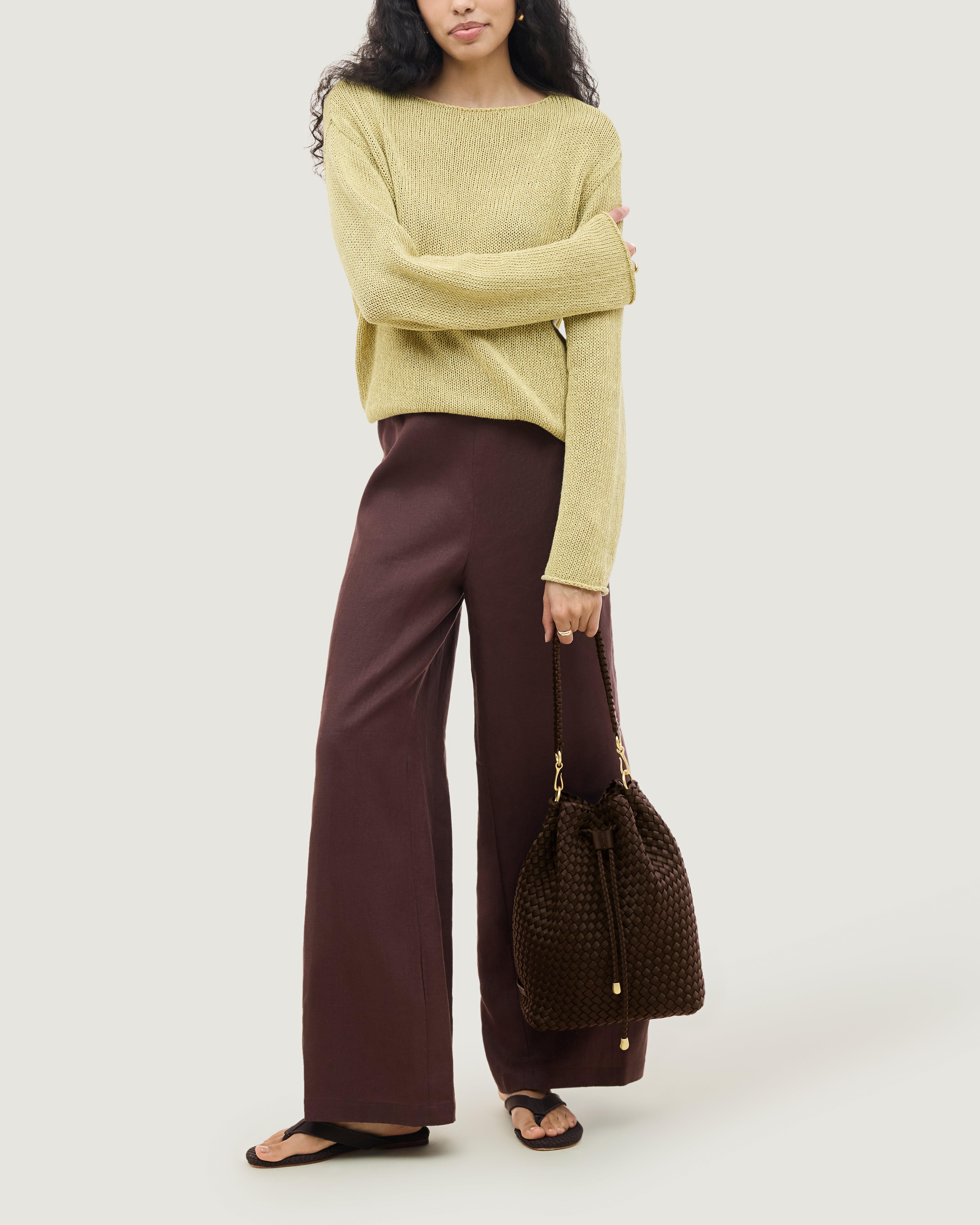 Mercer Bucket in Chocolate shown on model to illustrate scale and soft silhouette.