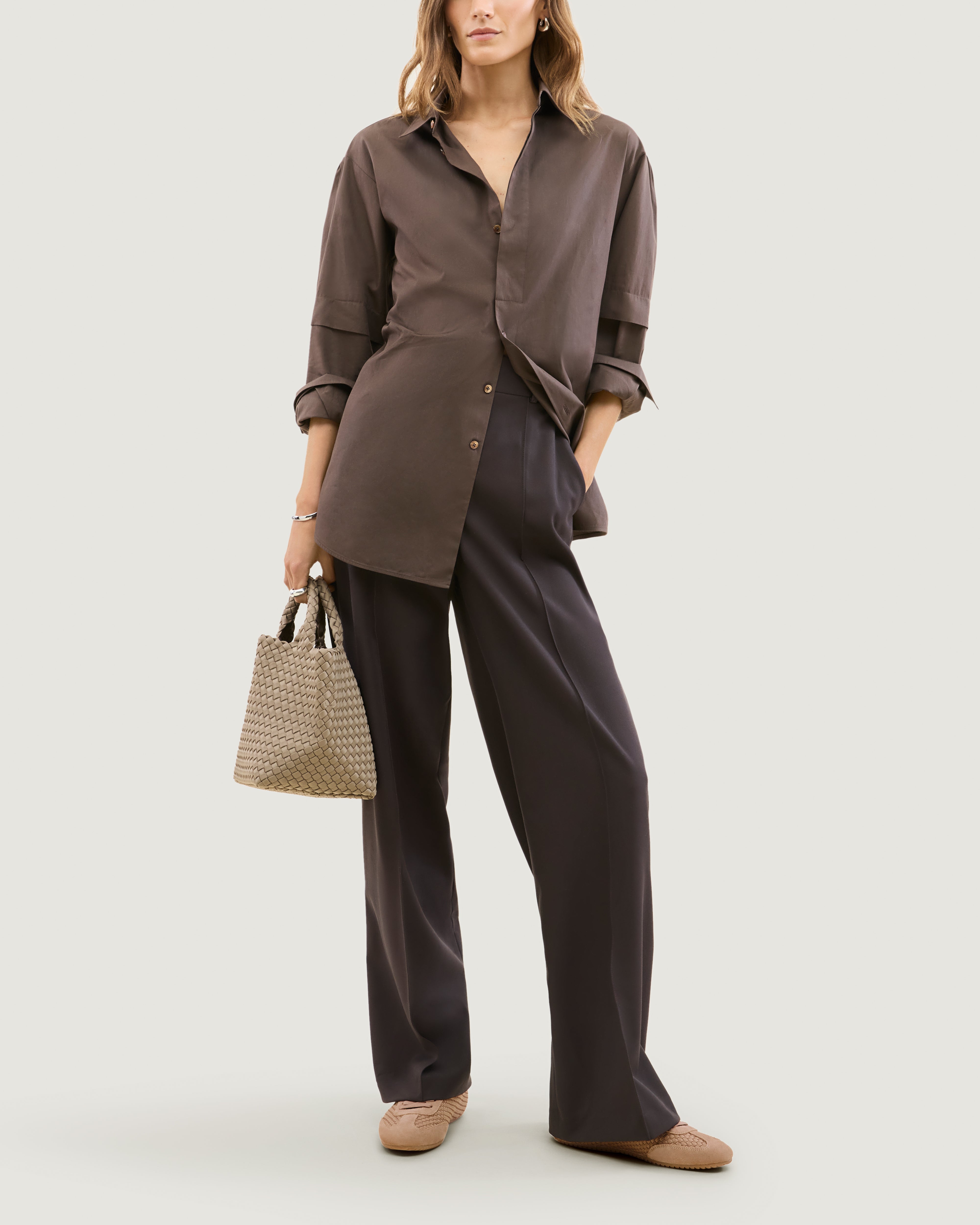 The Milan Sneaker in Seychelles shown on model.