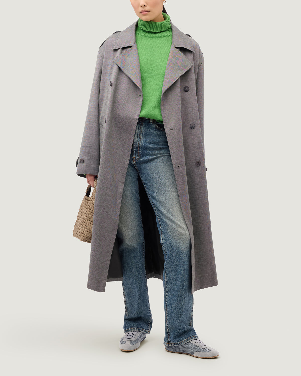 The Milan Sneaker in Slate Blue shown on model.