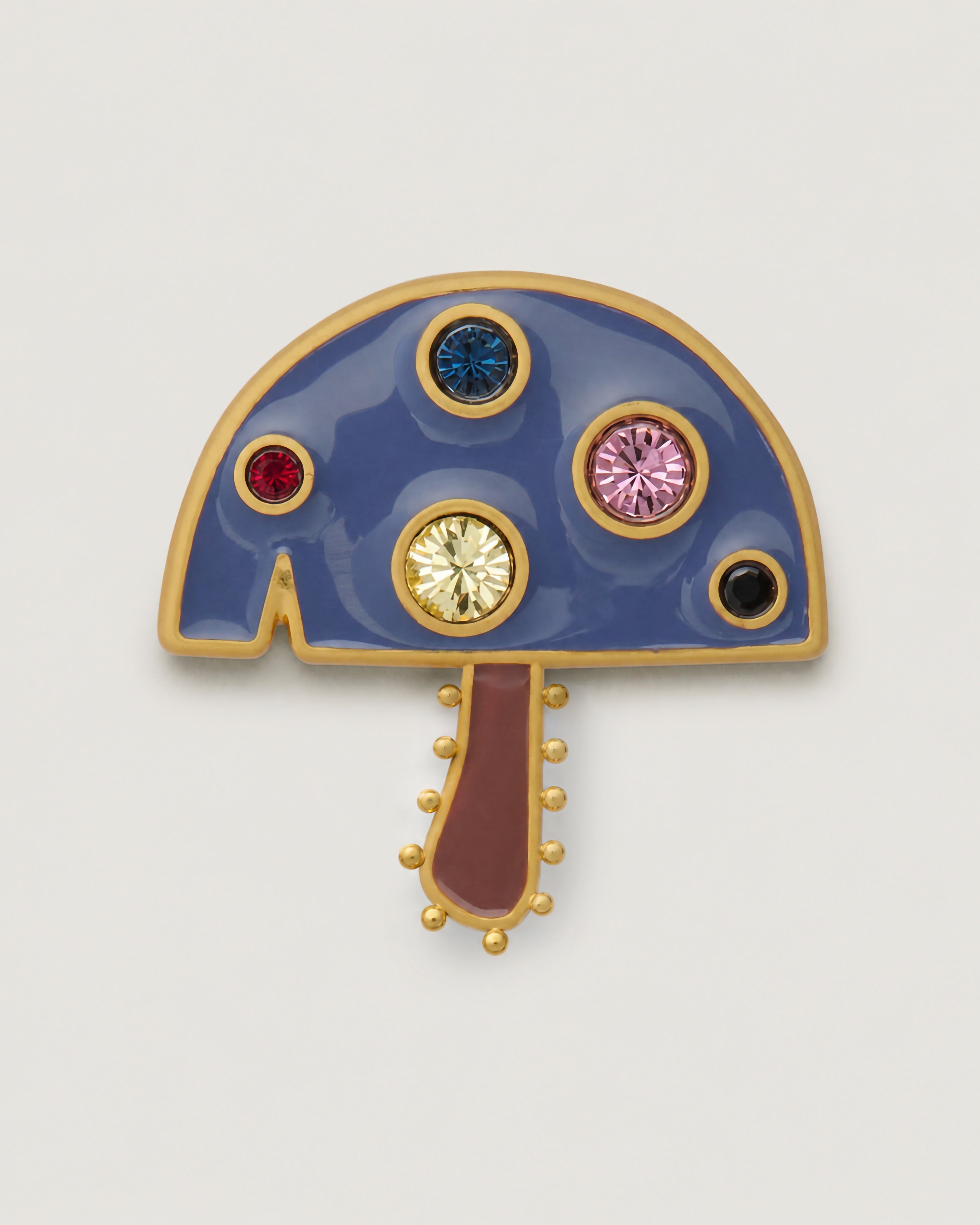 Brushed gold with enamel Magic Mushroom bag charm featuring colored gem stones.