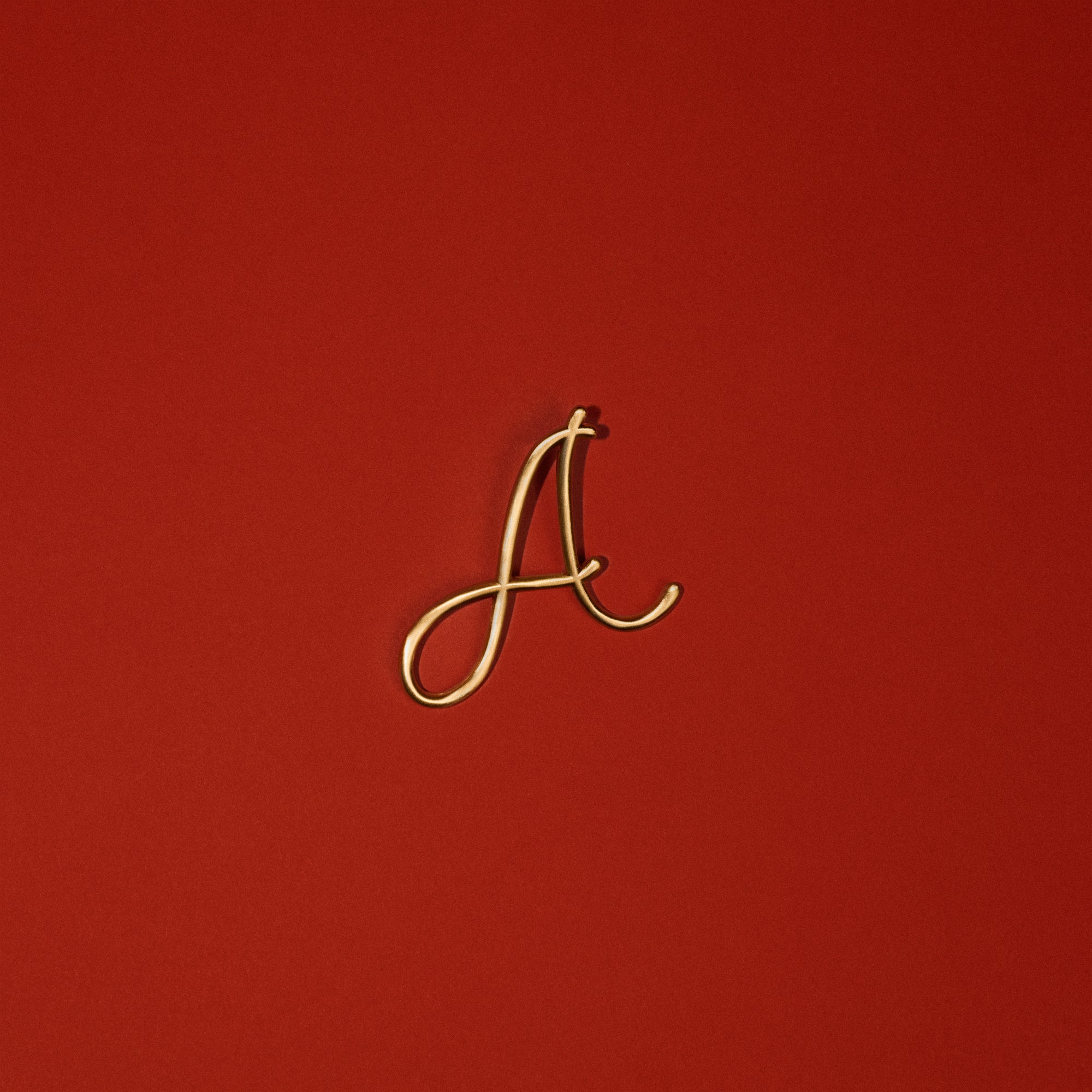 Alphabet Bag Charm in Brushed Gold | Main