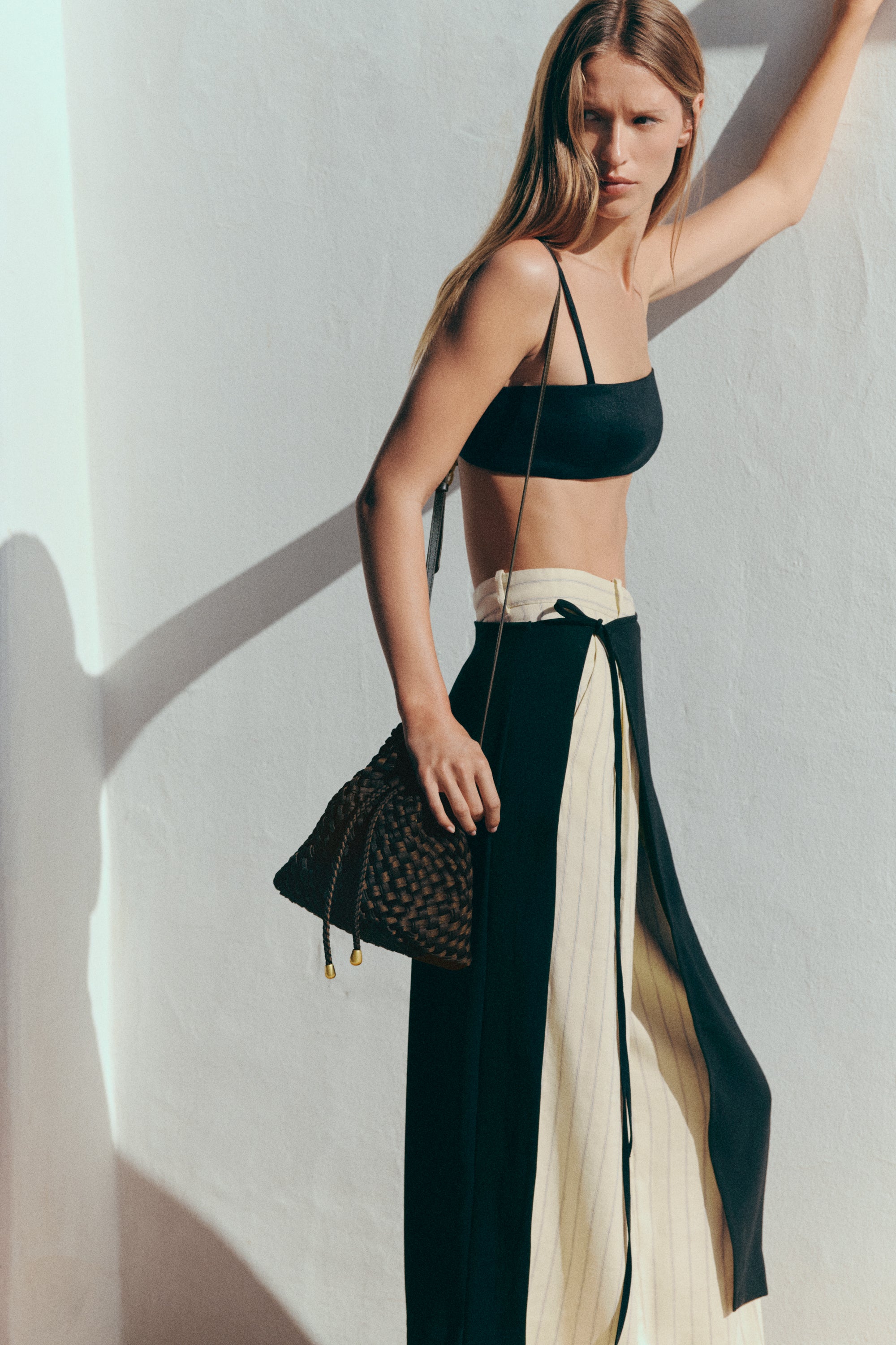 Gramercy Bucket in Chocolate shown on model to illustrate scale and soft silhouette.