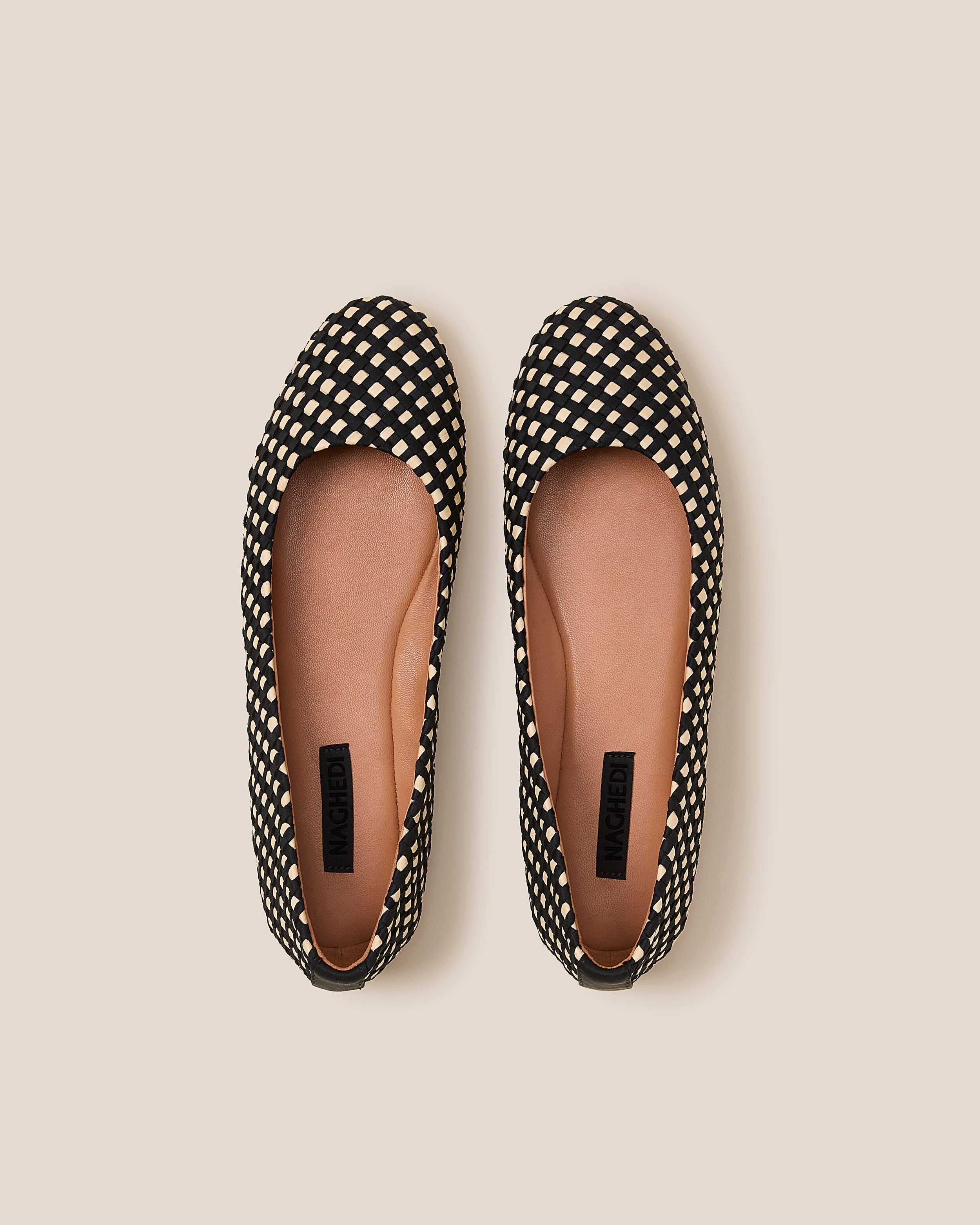 Top view of pair of The Nomad Ballet Flat in Costa showing the natural tanned leather insole.