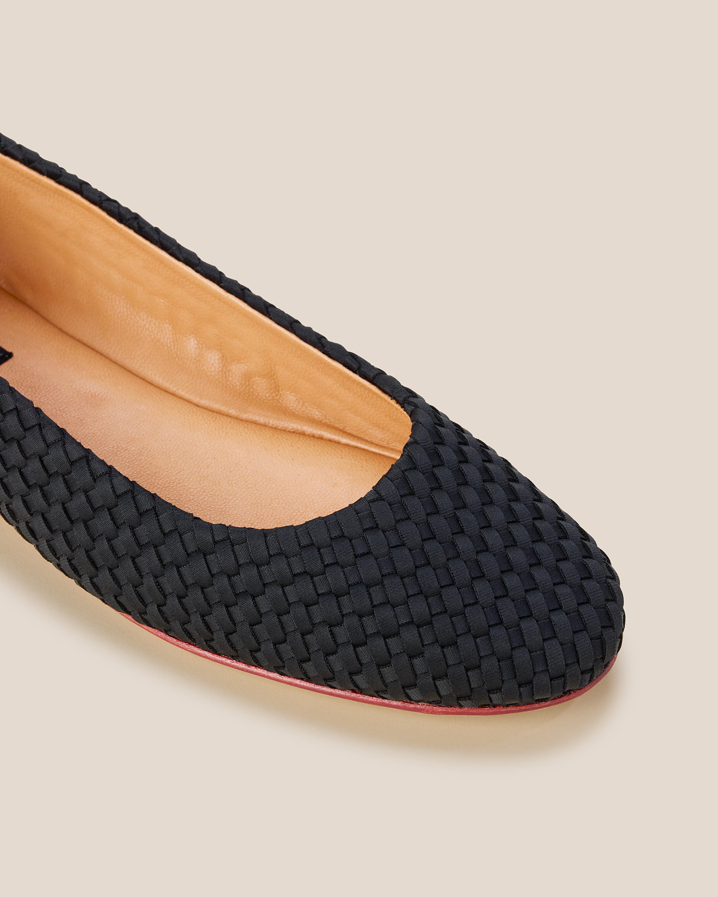 Close-up of The Nomad Ballet Flat in Onyx showing its closed toe and square silhouette.
