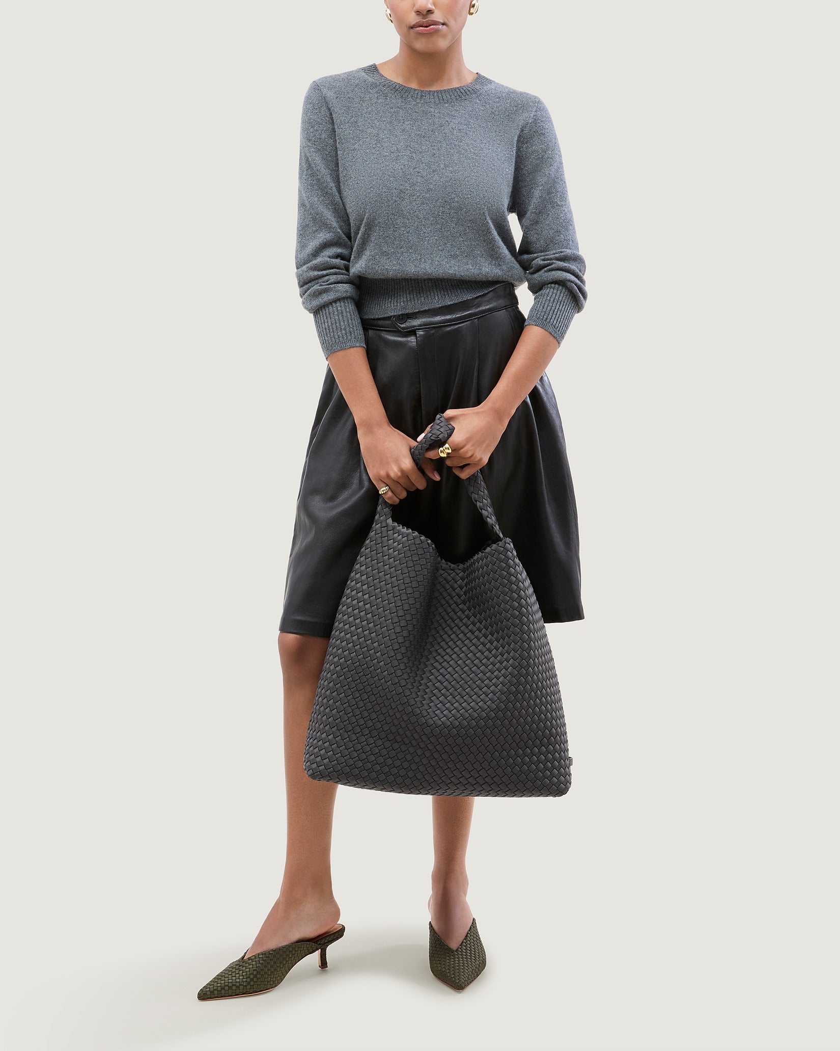 Nomad Large Hobo Bag in Ash shown on model to illustrate scale and soft silhouette.