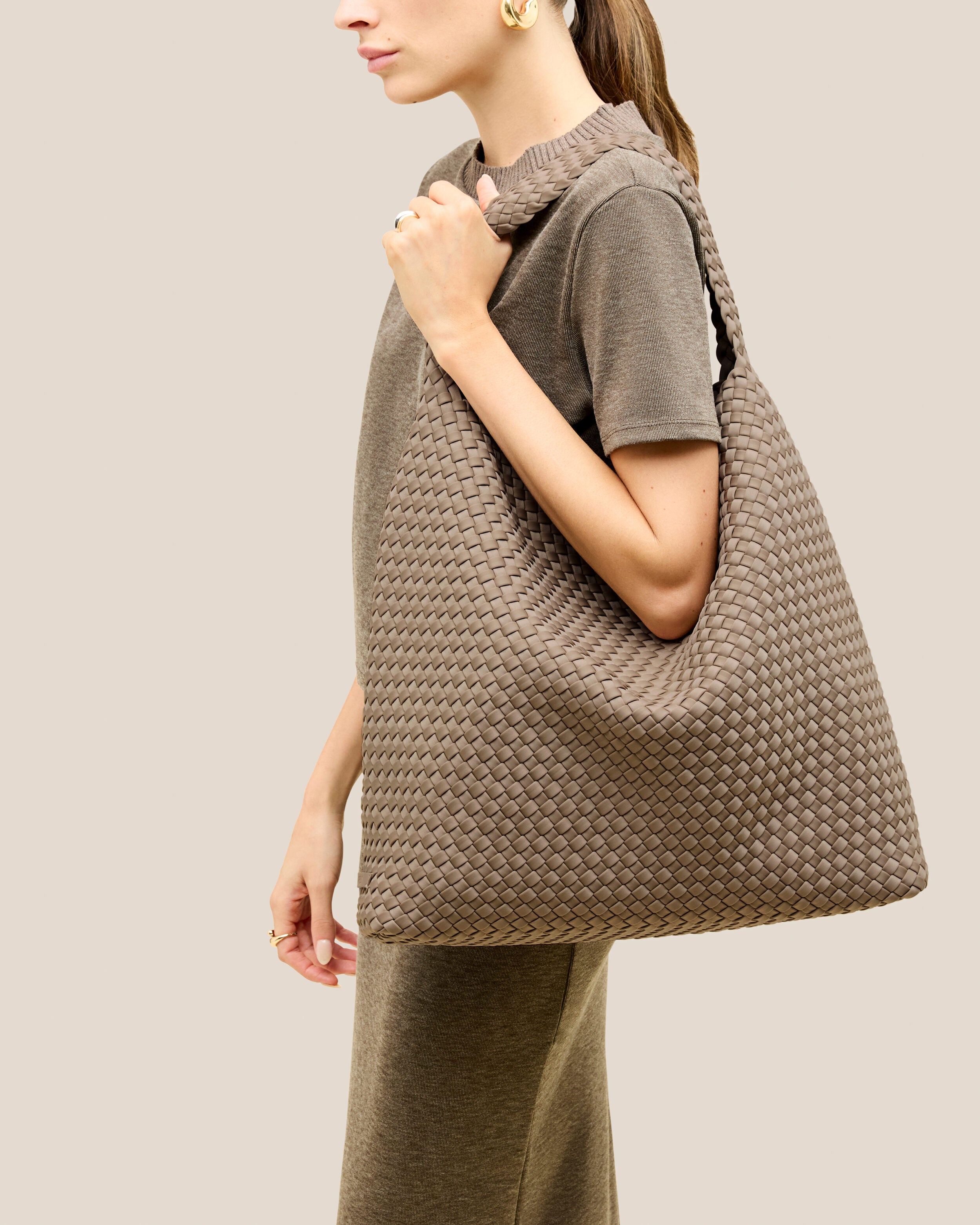 Nomad Hobo in Cashmere shown on model to illustrate scale and soft silhouette.