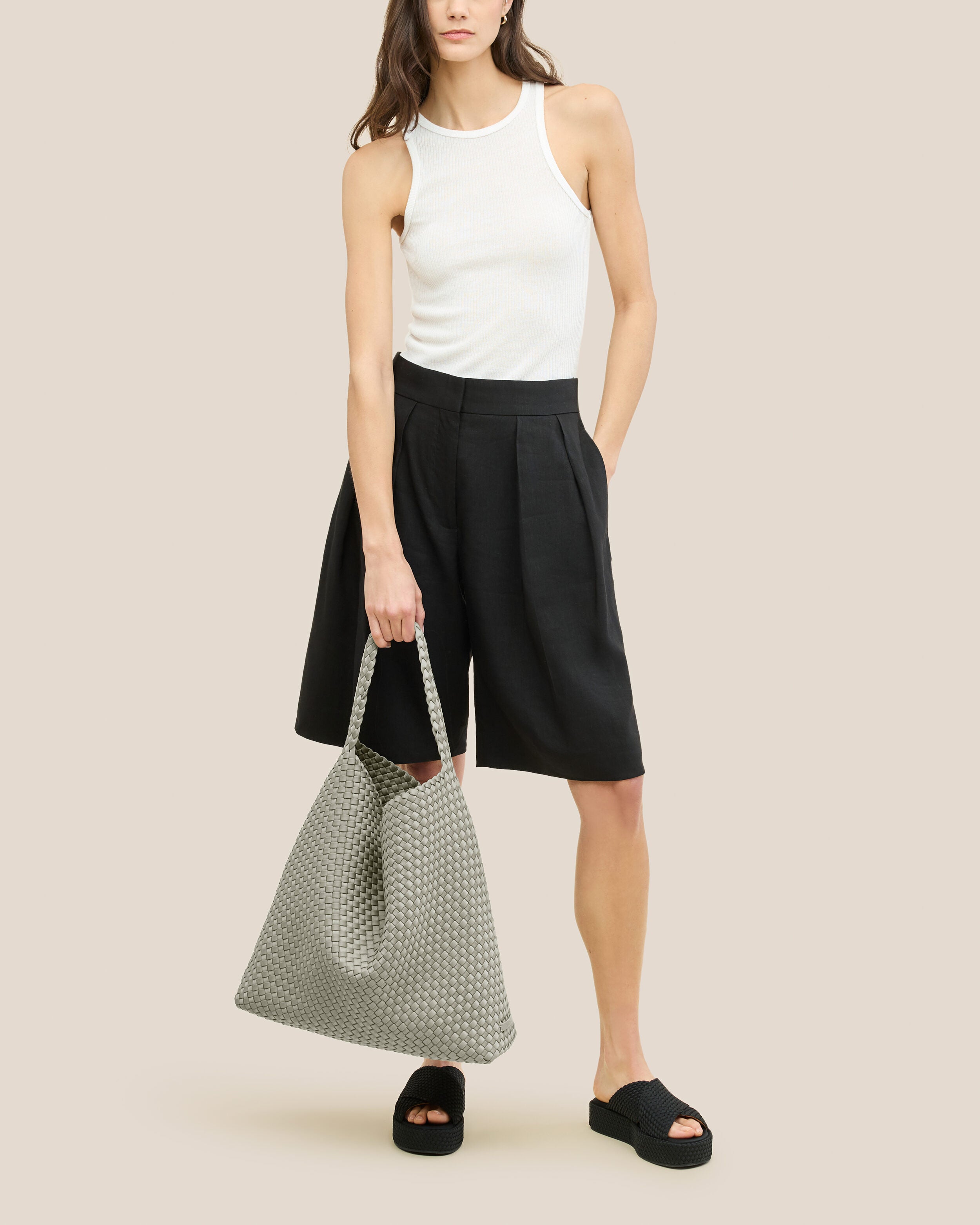 Nomad Hobo in Celadon shown on model to illustrate scale and soft silhouette.