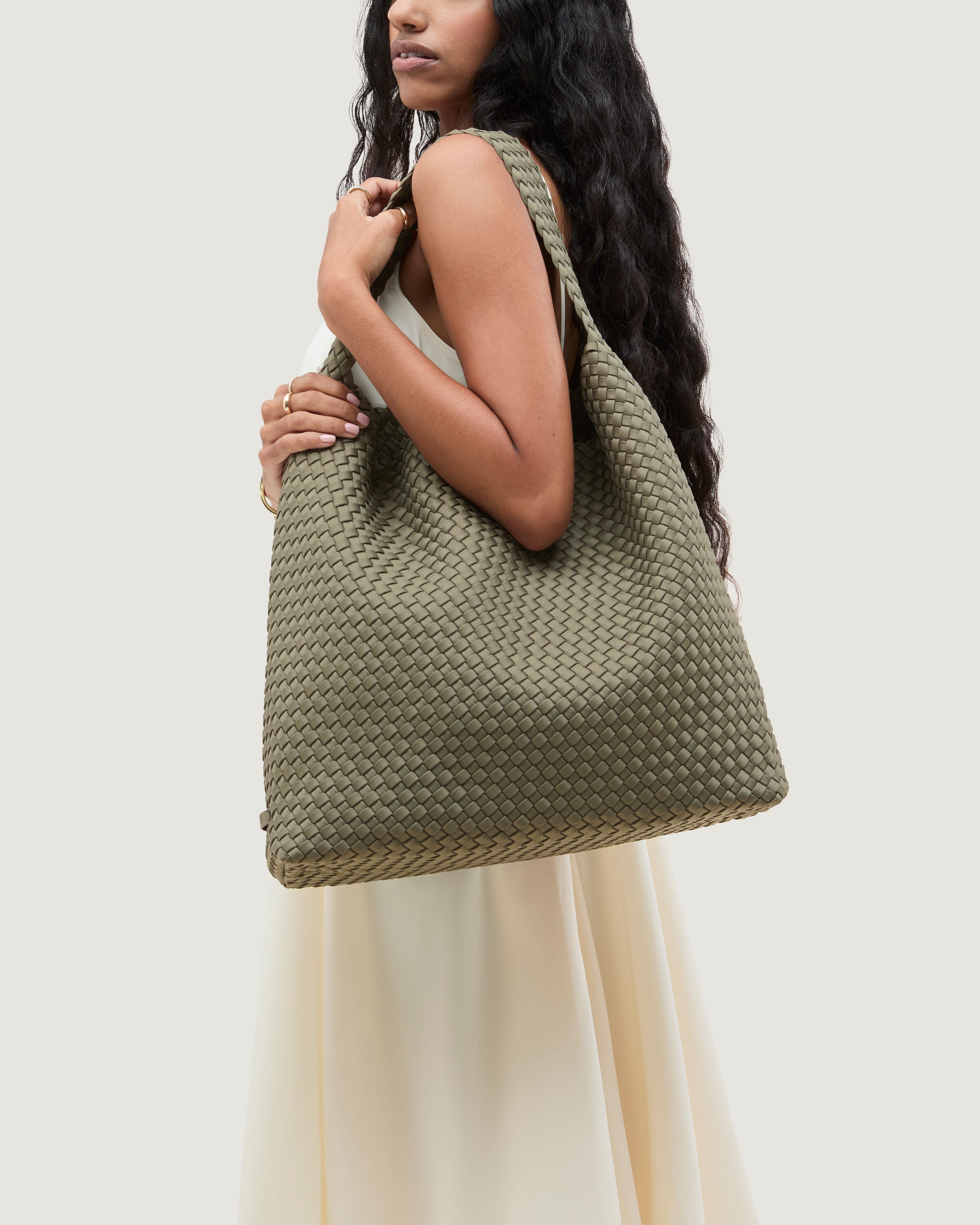 Nomad Hobo in Olea shown on model to illustrate scale and soft silhouette.