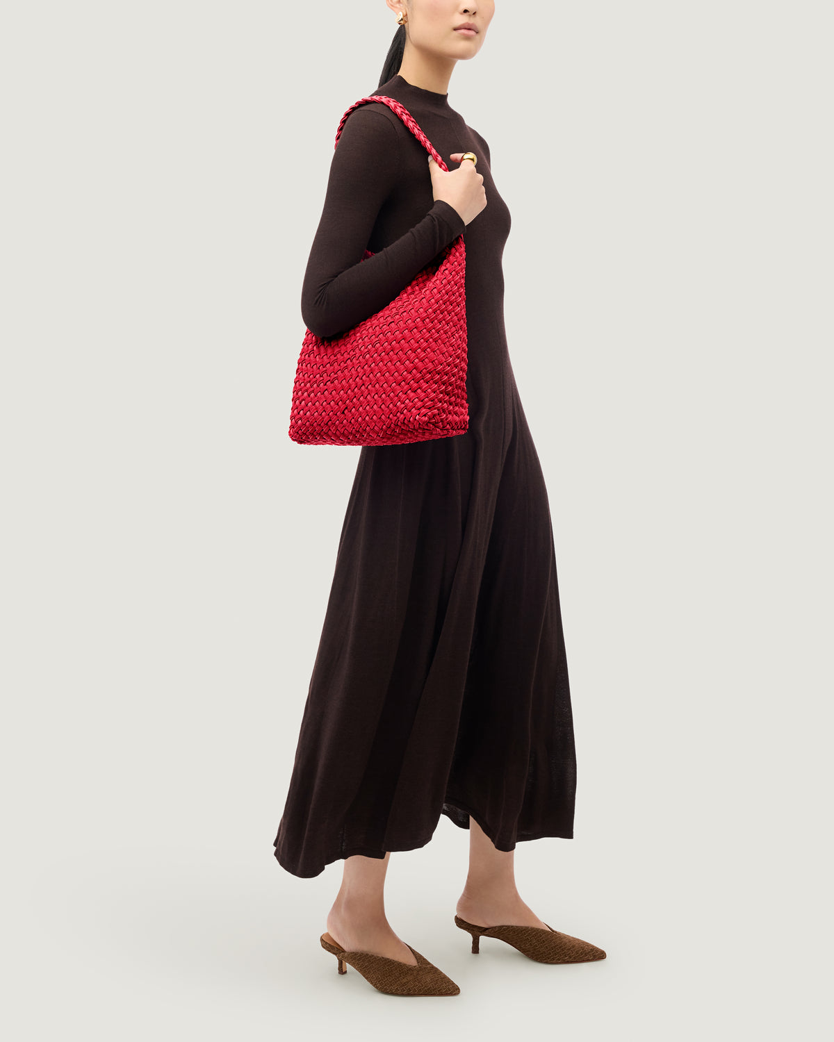 Nomad Medium Hobo in Cerise shown on model to illustrate scale and soft silhouette