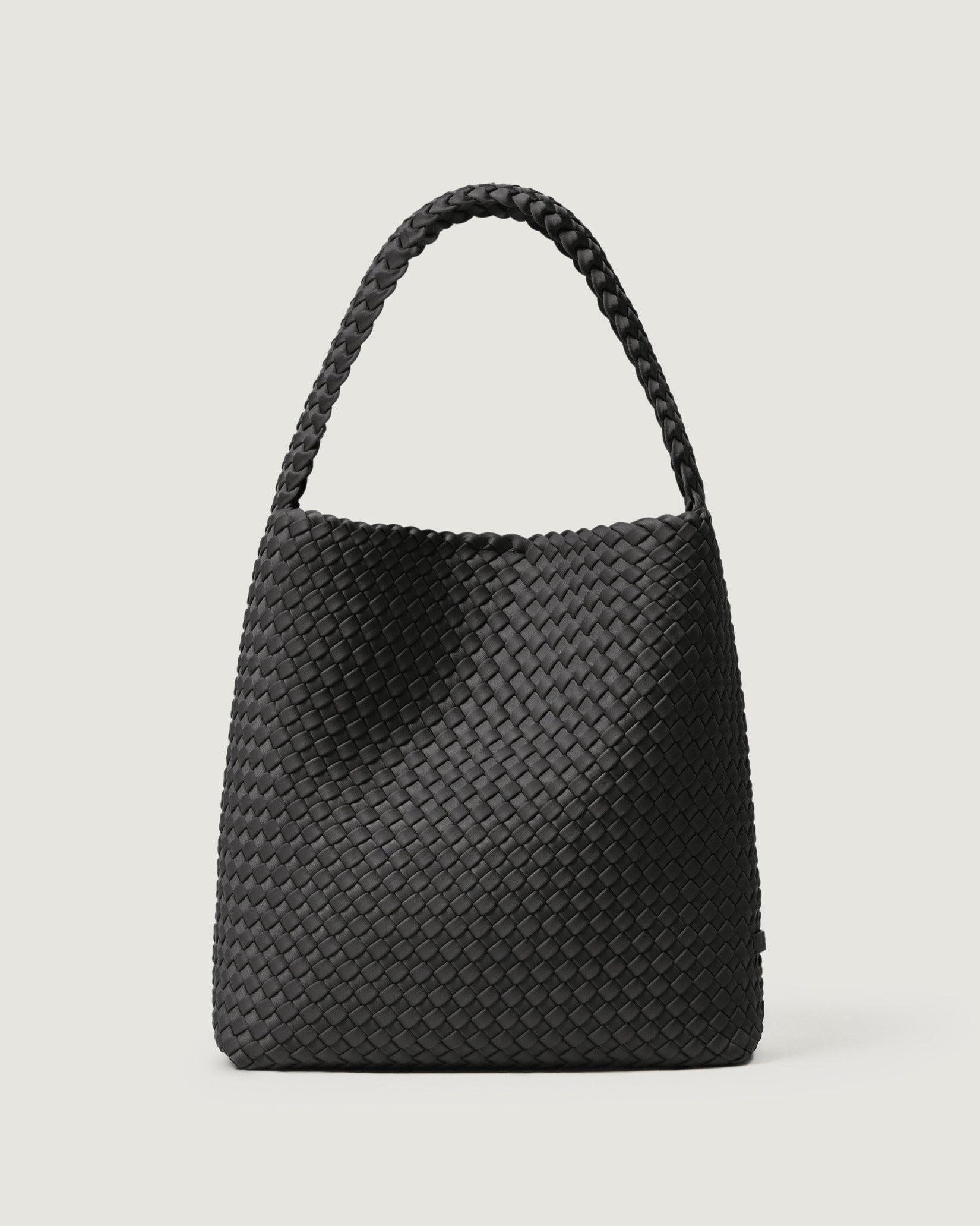 Nomad Medium Hobo Bag in Ash, a slate gray  tone, in handwoven neoprene featuring an open top with magnetic snap closure, and handwoven shoulder strap lays comfortably flat.