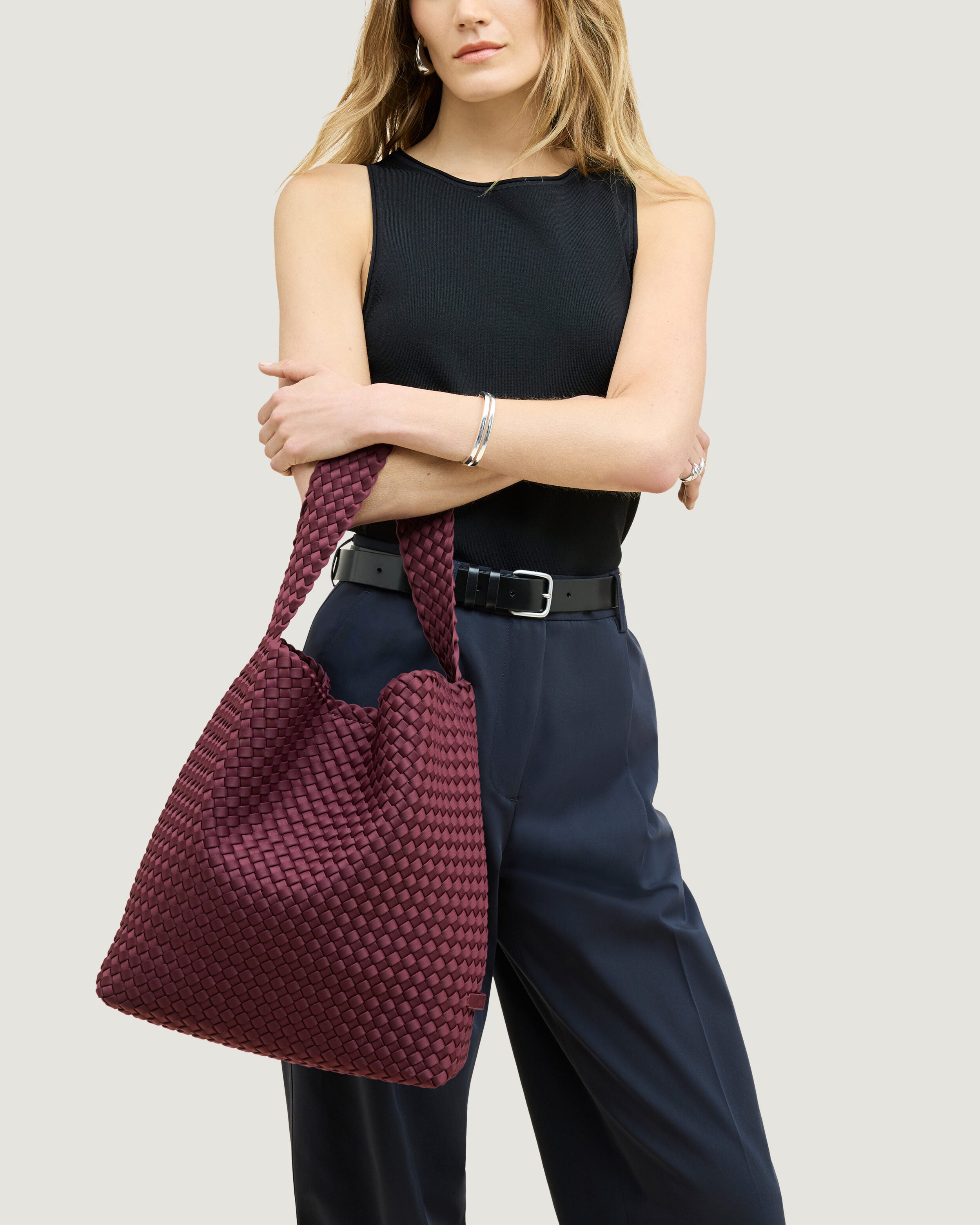 Nomad Hobo in Bordeaux shown on model to illustrate scale and soft silhouette.