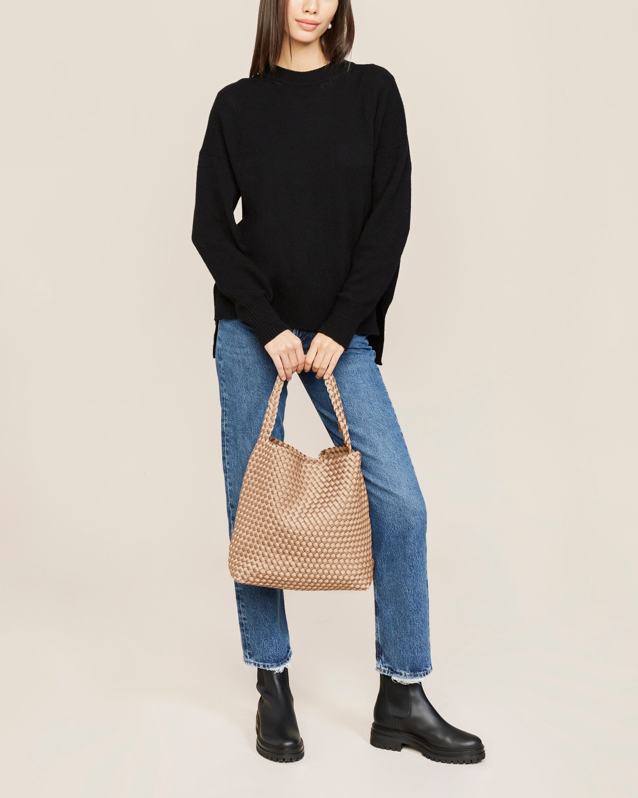 Nomad Hobo in Camel shown on model to illustrate scale and soft silhouette.