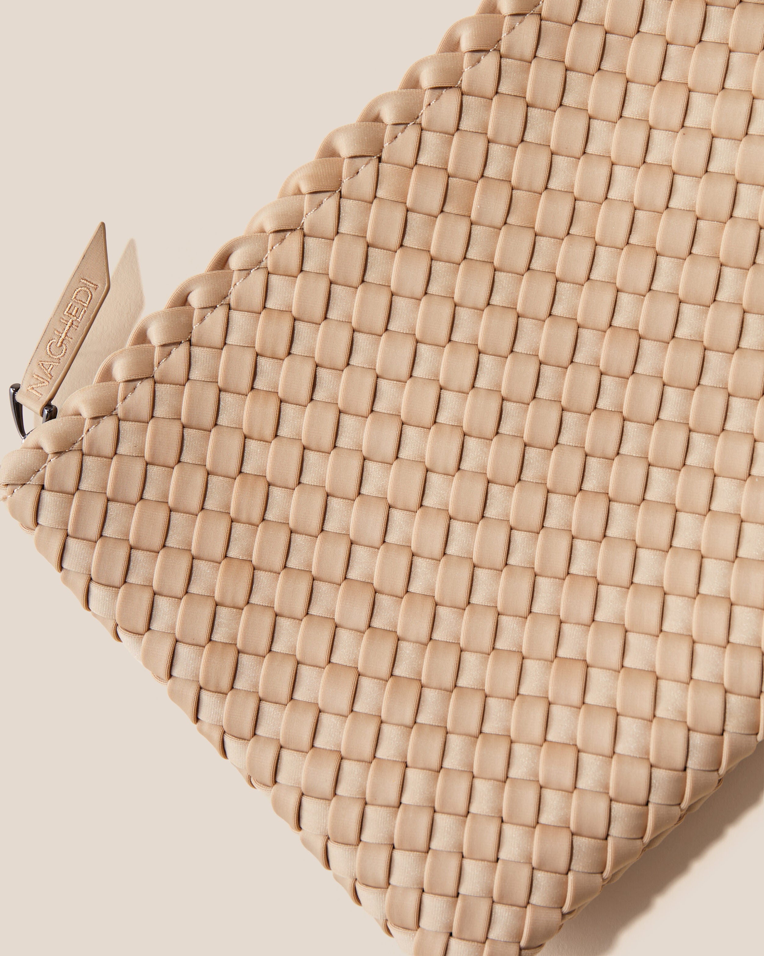 Close-up of included matching woven zippered pouch.