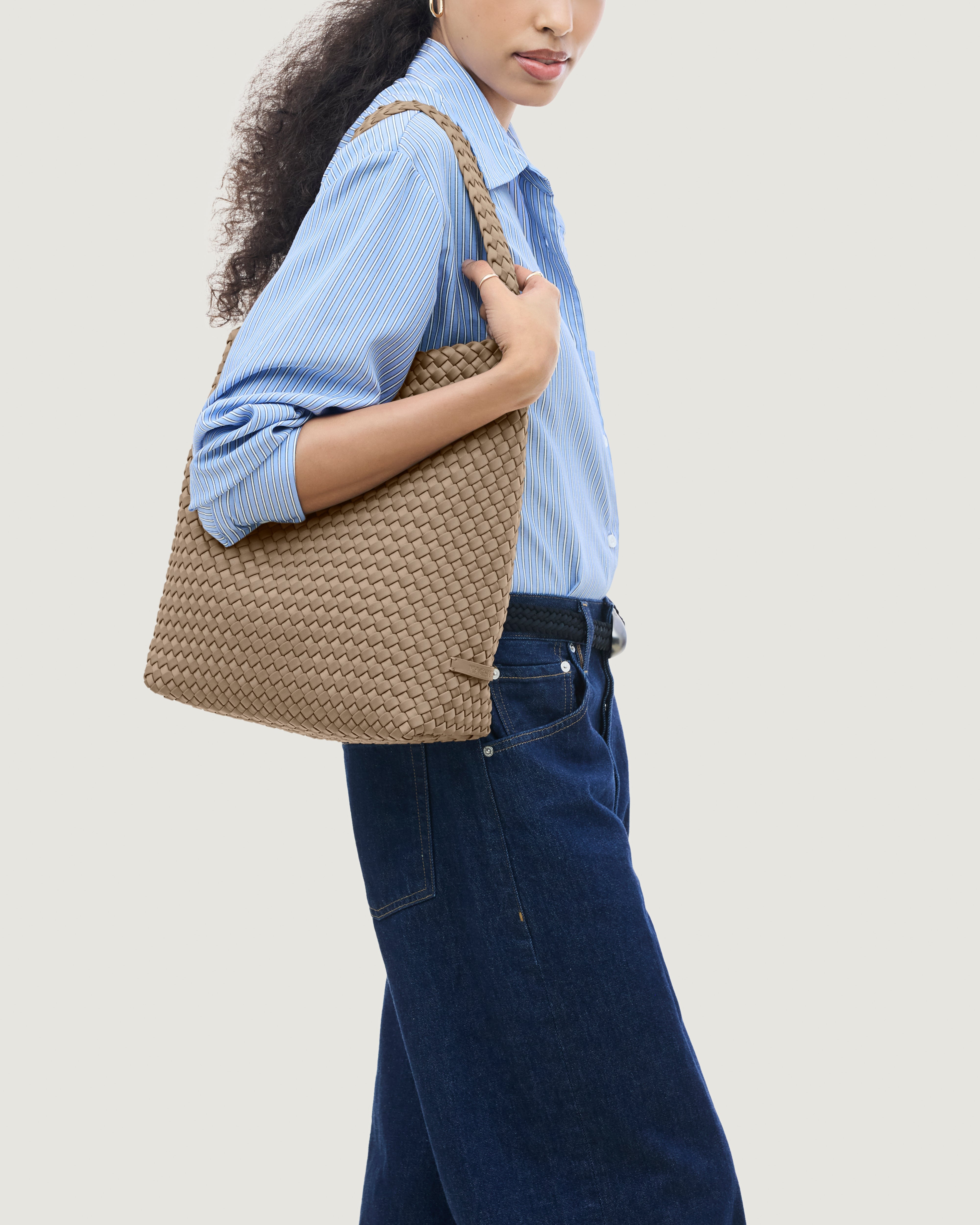 Nomad Hobo in Cashmere shown on model to illustrate scale and soft silhouette.