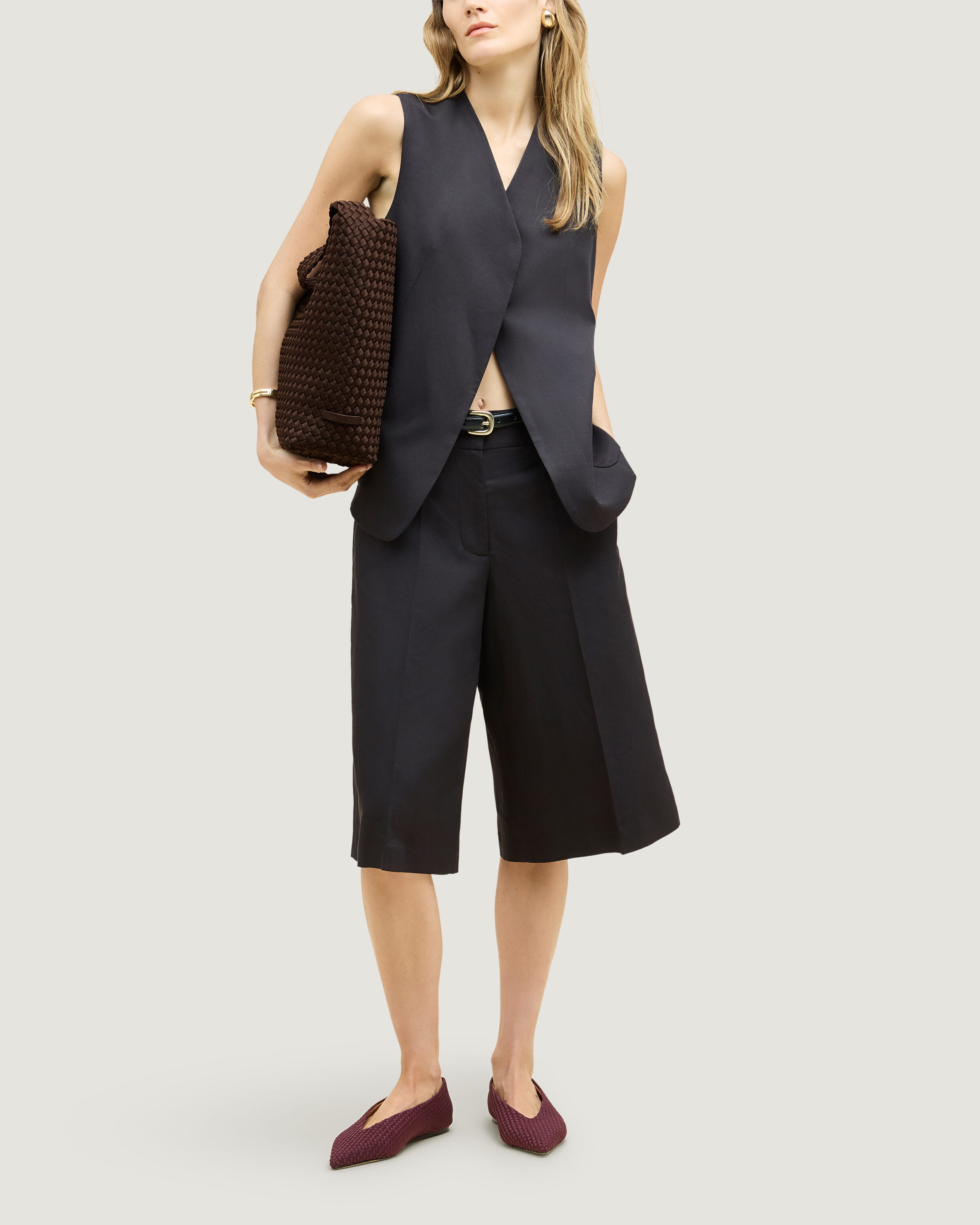 Nomad Hobo in Chocolate shown on model to illustrate scale and soft silhouette.