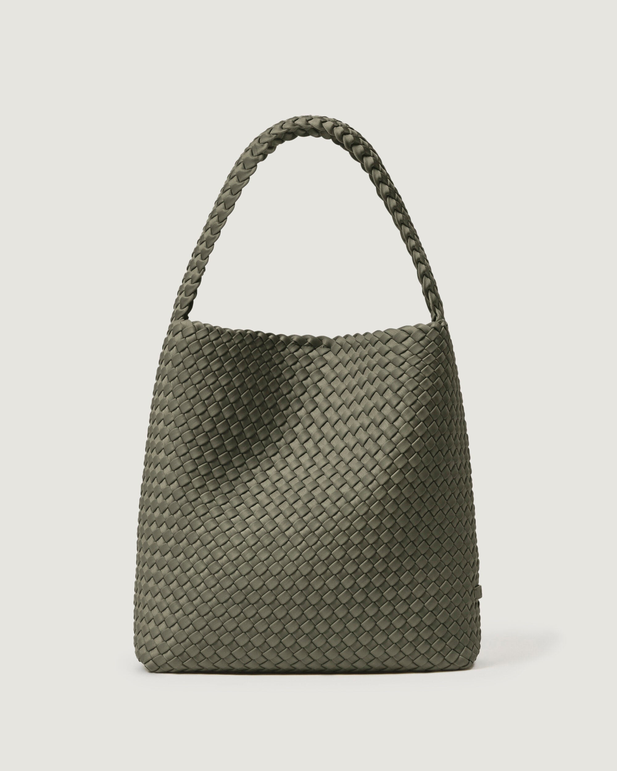 Nomad Hobo in Olea, a sage green tone, in handwoven neoprene, featuring an open top with magnetic snap closure, and handwoven shoulder strap lays comfortably flat.