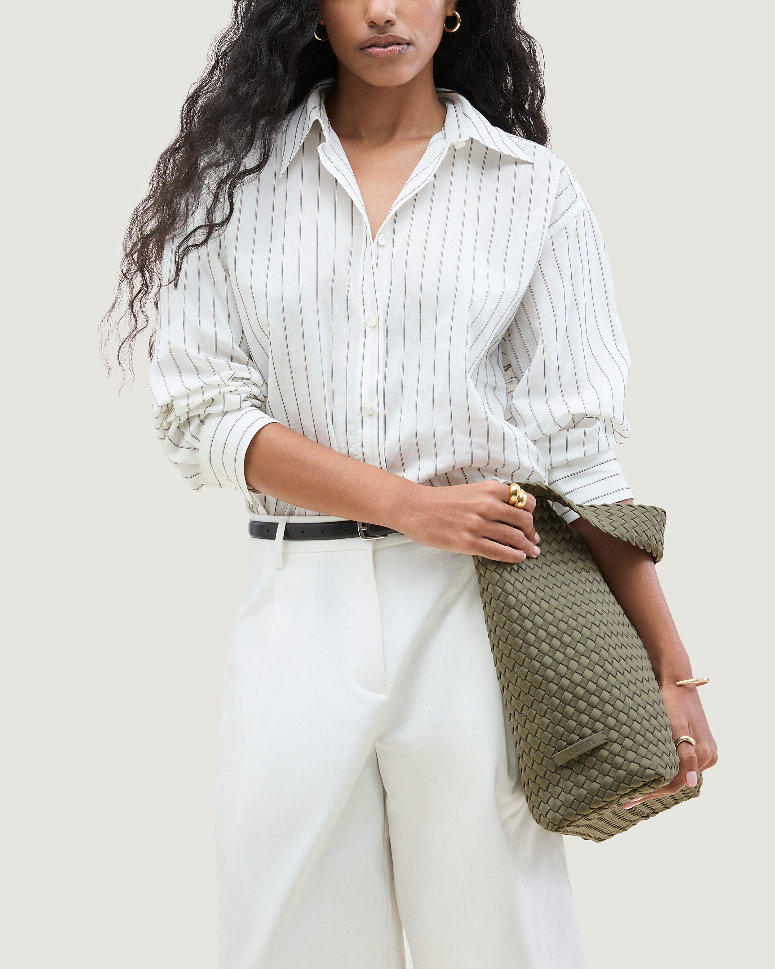 Nomad Hobo in Olea shown on model to illustrate scale and soft silhouette.